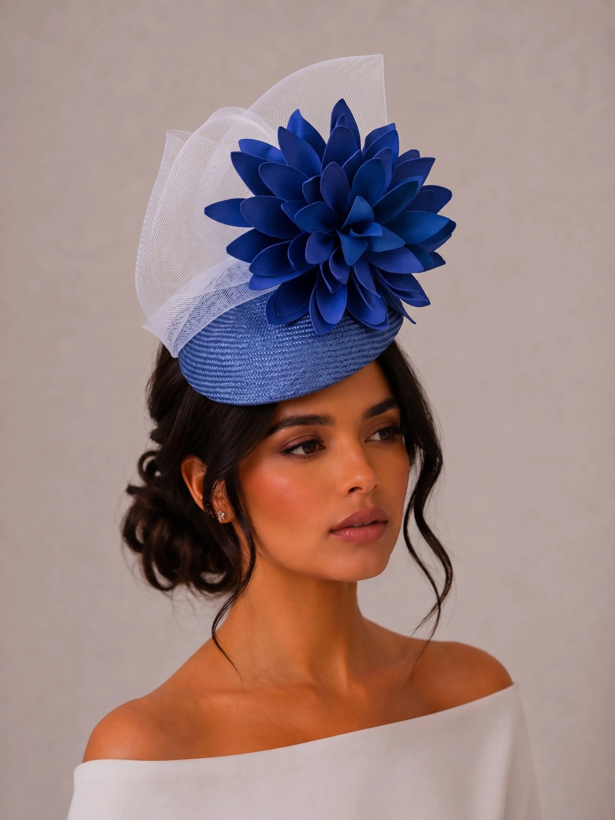 PETALIA Blue worn by a model, showcasing the statement floral design and flattering fit.