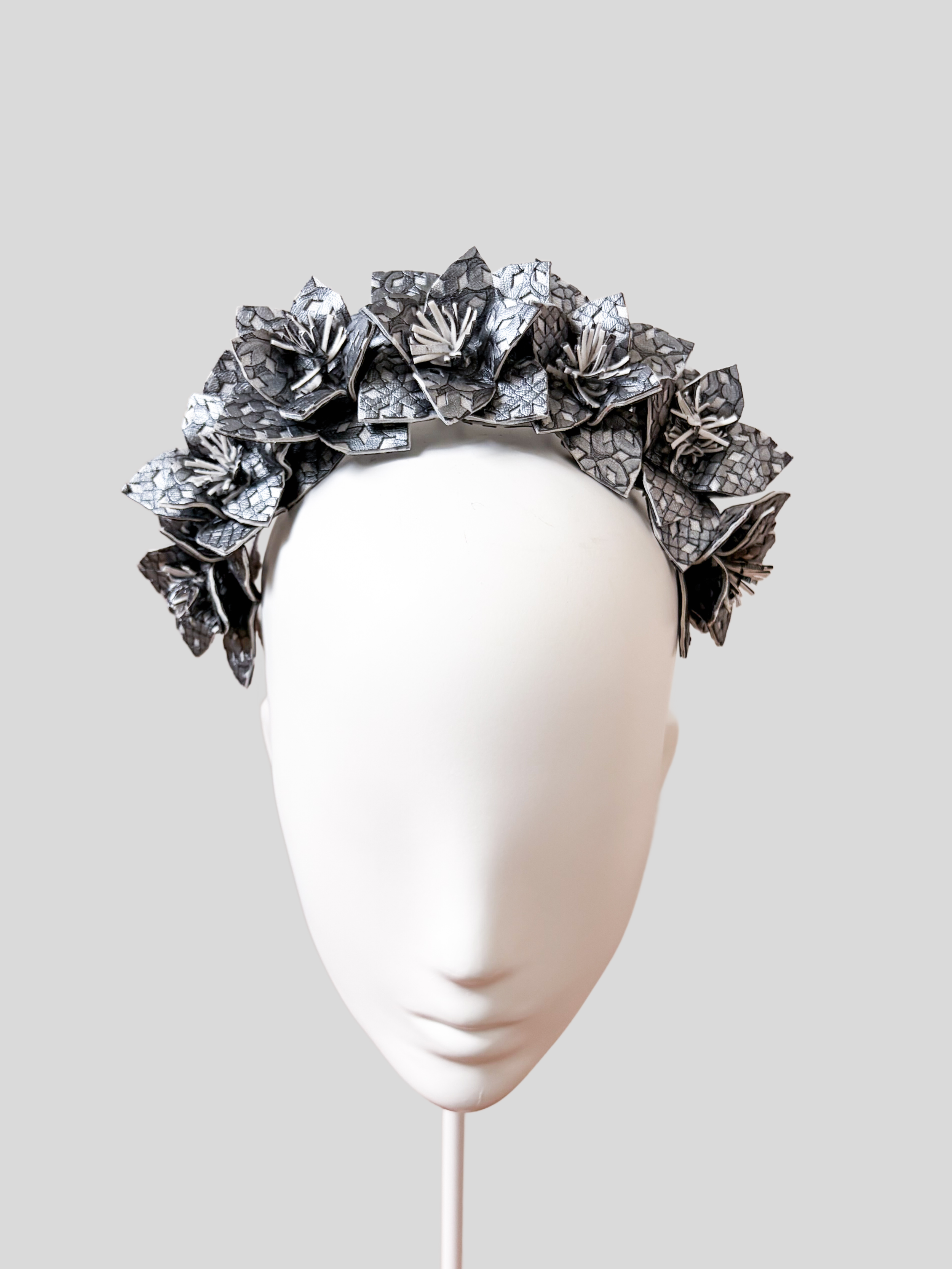 silver-textured-faux-leather-floral-headband-front-view.jpg.png