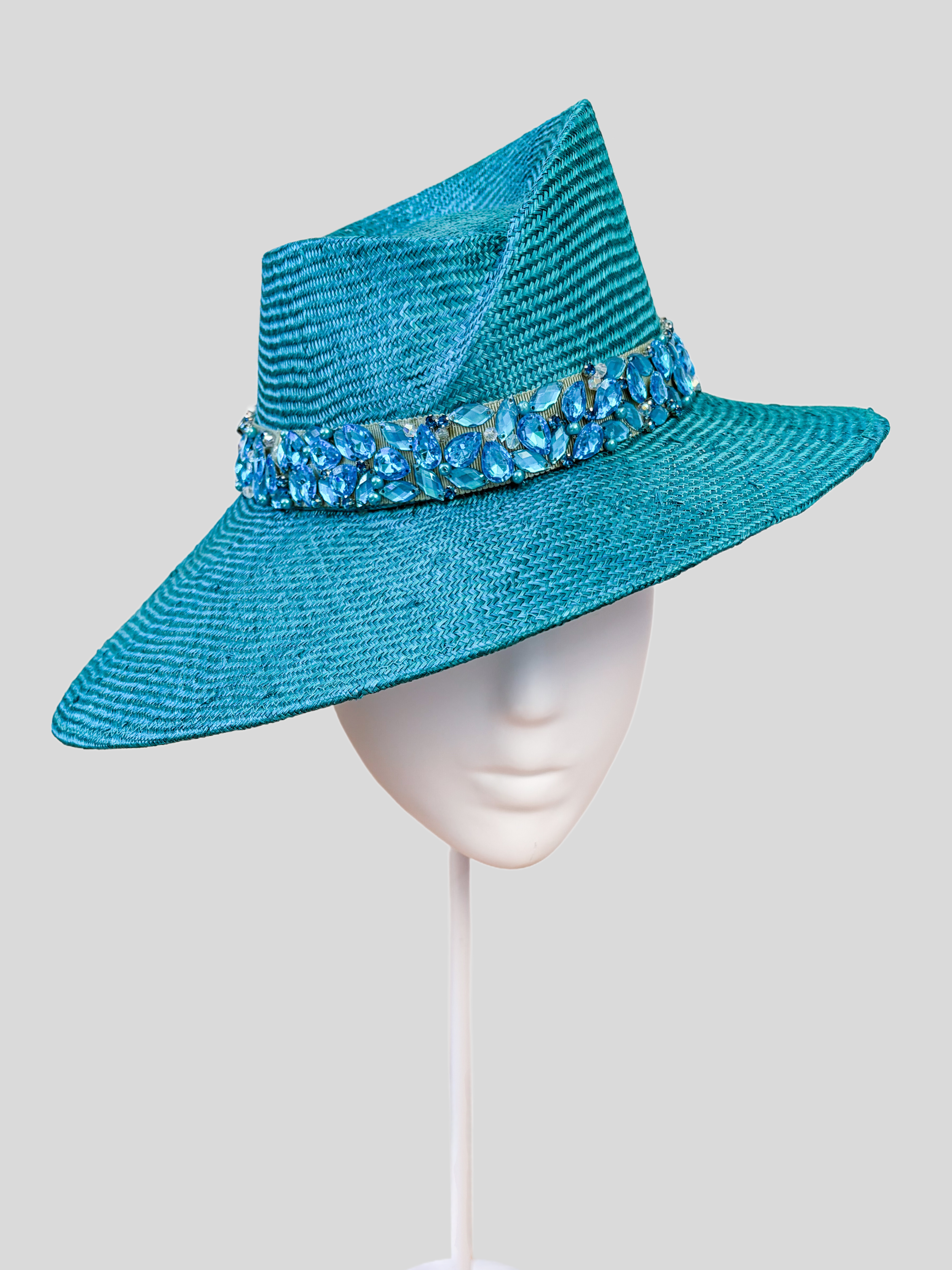 Close-up: Close-up of the hand-embellished blue beaded and crystal-style band on the MAISON Azure Parisisal fedora.