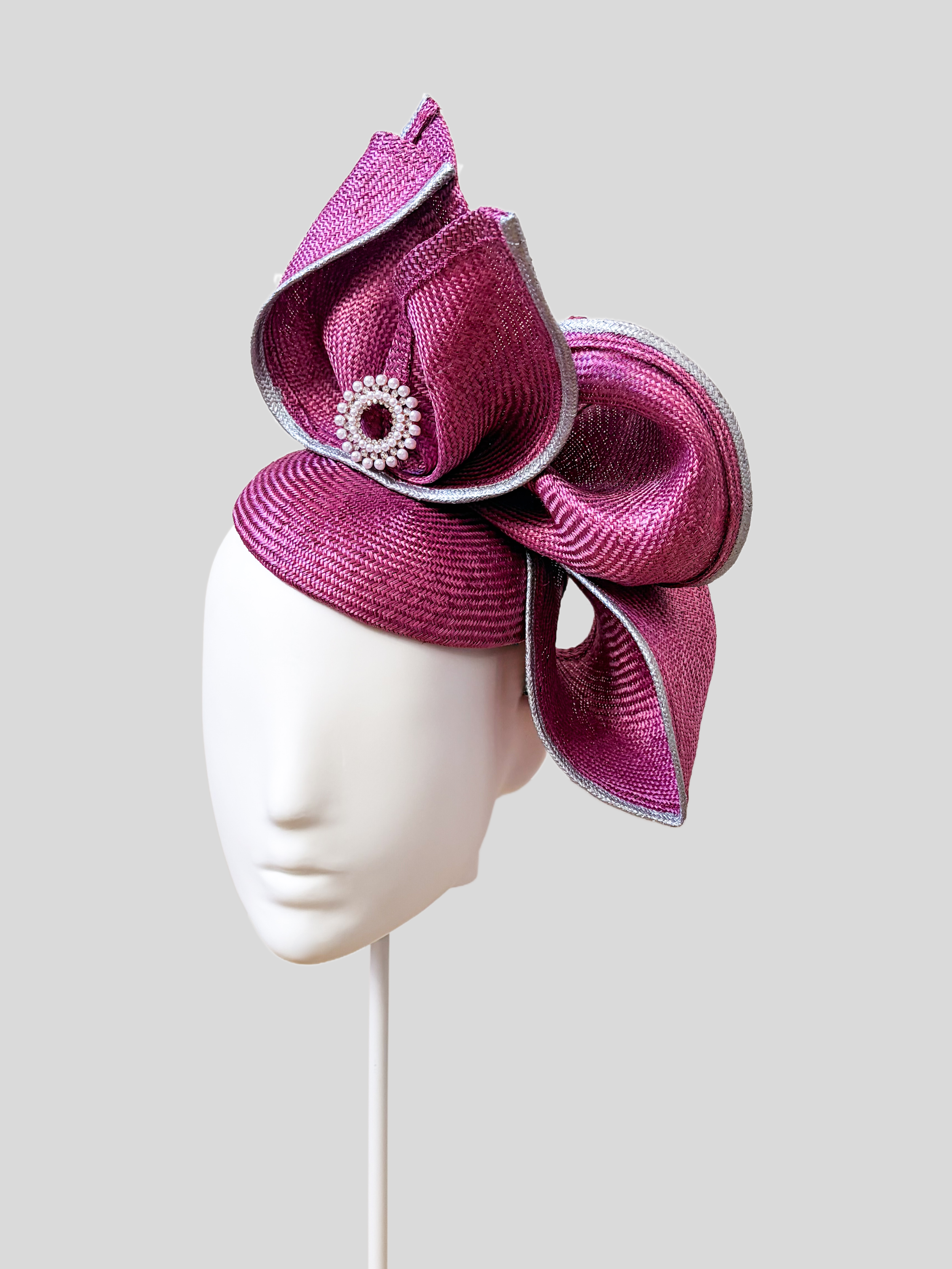 Aria Amethyst sculptural headpiece shown from the right side.
