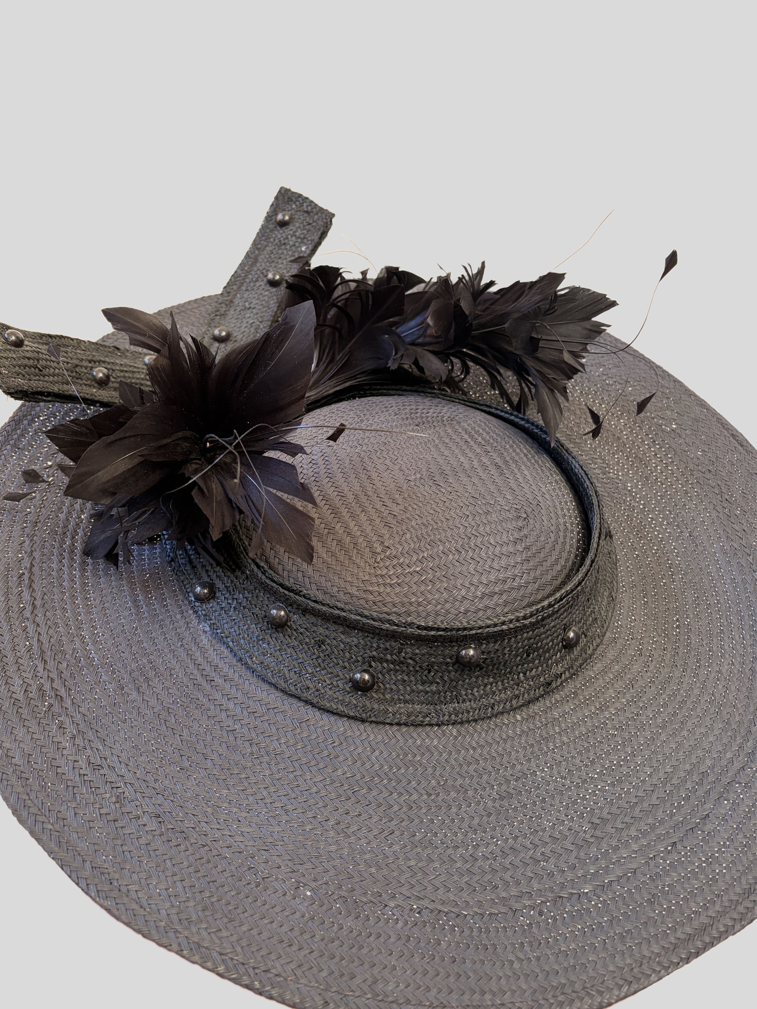 black-feather-hat-close-up-detail.jpg.png