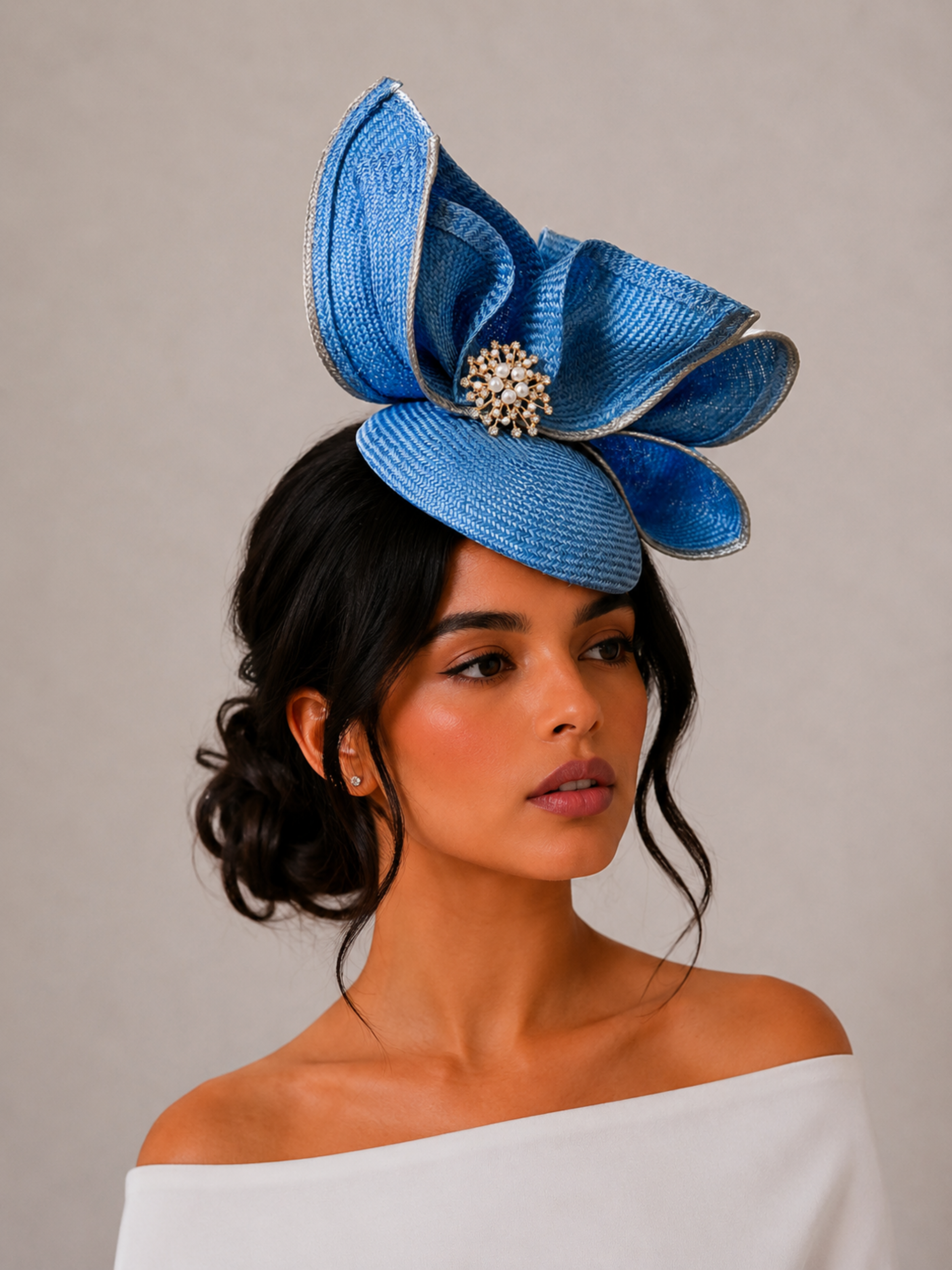 aria-sapphire-sculptural-parisisal-headpiece-model.png