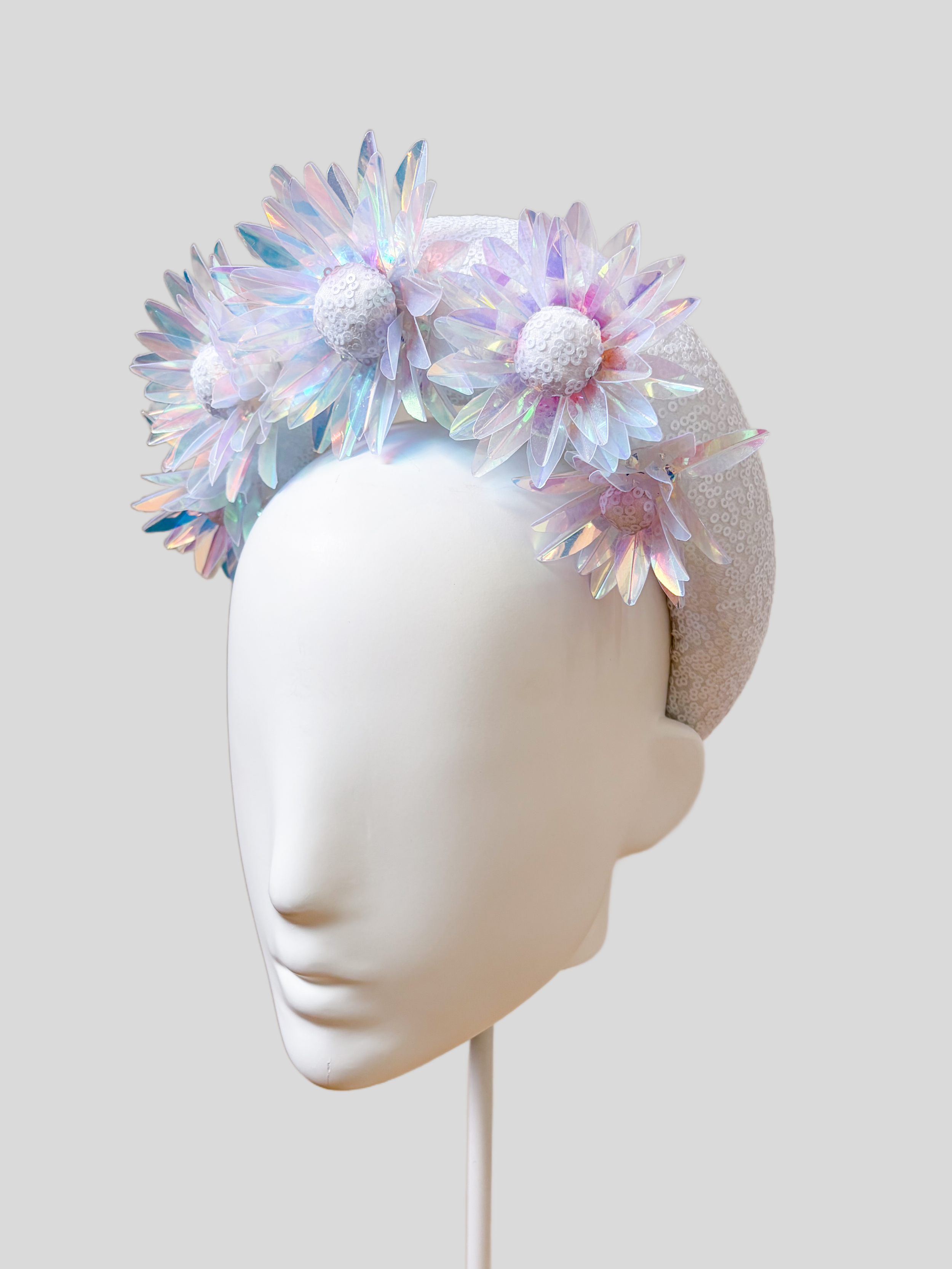 Right: LUMINA white floral halo headpiece side view