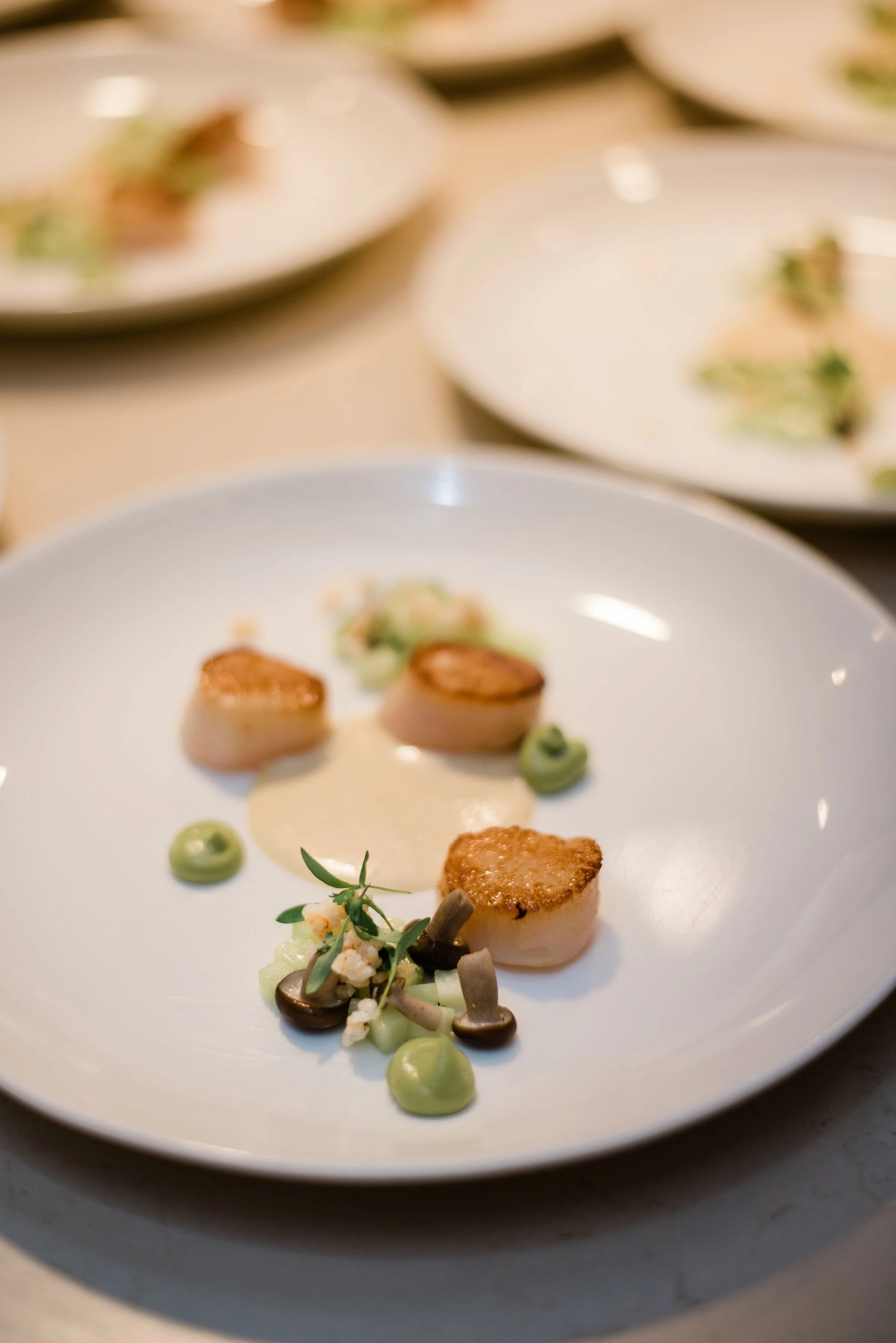 Dinner of scallops, Botanist restaurant at Fairmont Pacific Rim.