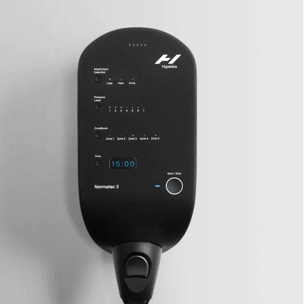 A medical or therapy device with a digital display, labeled 'Normatec 3,' featuring controls for time and start/stop, used for compression therapy.
