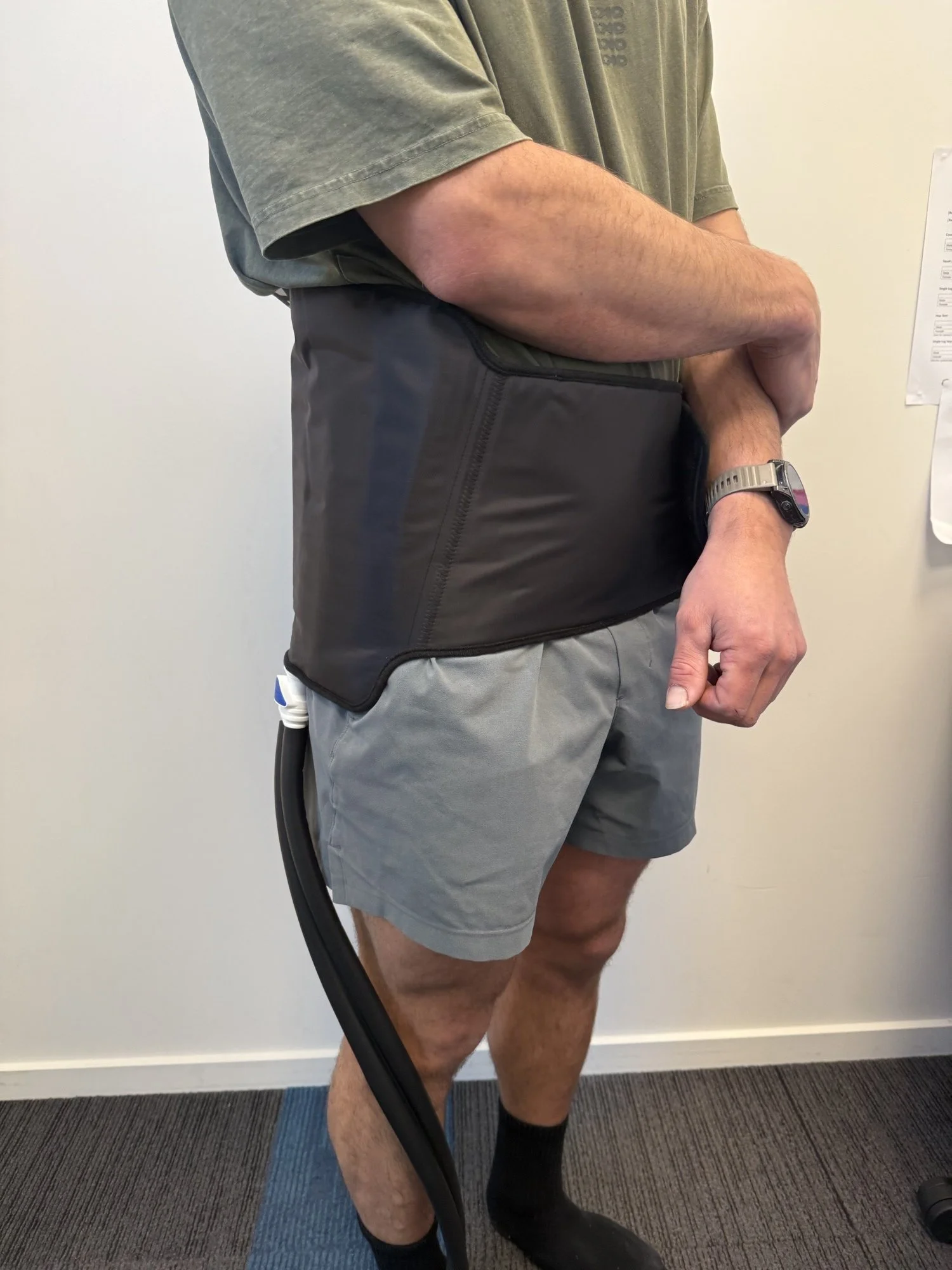 CryoPush hip wrap providing cold compression therapy during hip replacement recovery