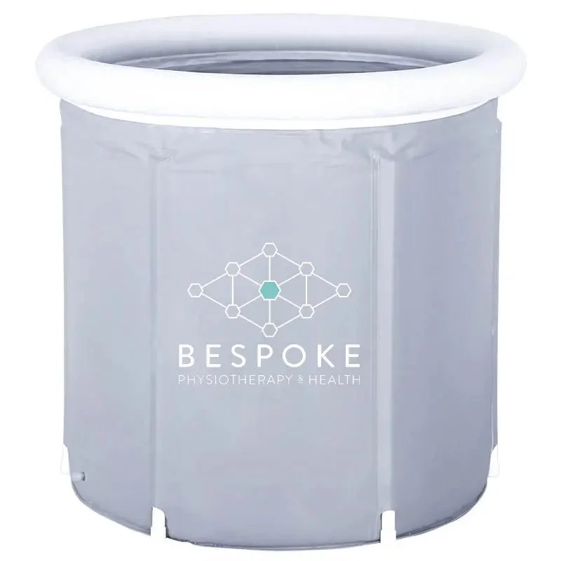 Portable water-filled therapy pool with 'BESPOKE Physiotherapy & Health' logo on the side.