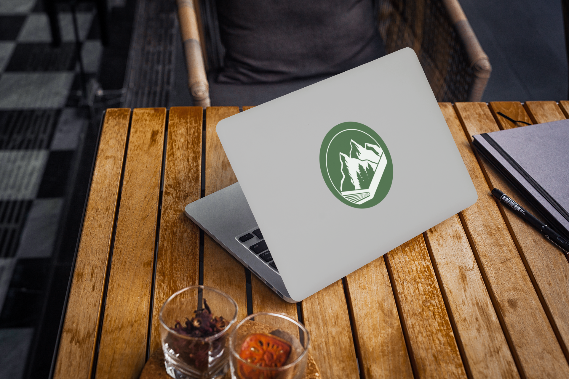 laptop-cover-mockup-featuring-a-computer-on-a-wooden-table-2287-el1.png