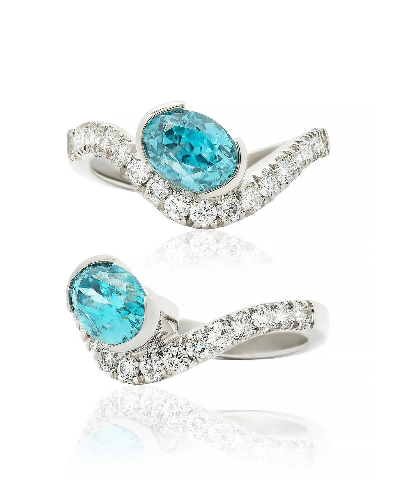 Zircon &amp; Diamond Ring

Blue Zircon : 2.2ct
Diamonds : .54ctw - VS1 - D/E
14kt White Gold
$5,000

Big Island Jewelers
Fine Jewelry - Made by Hand
#madeinhawaii
