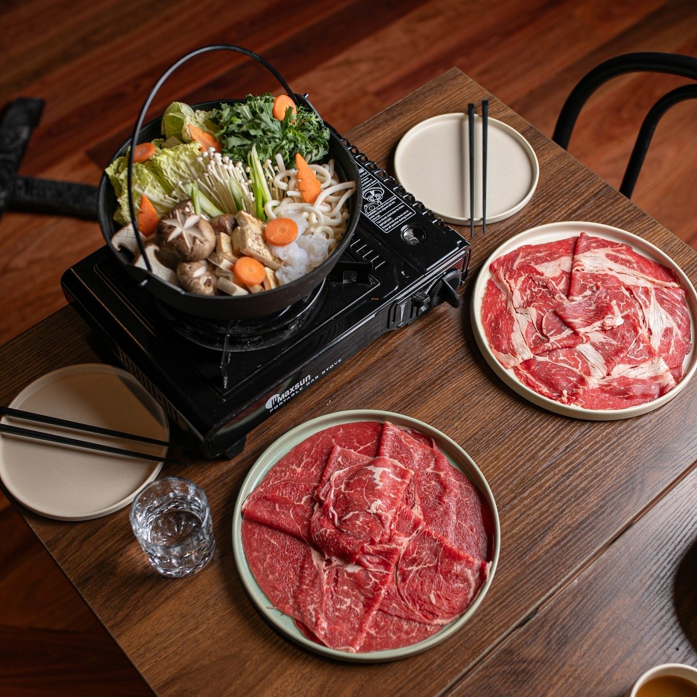 Discover sukiyaki heaven at Chop Chop! 

Choose between our Wagyu MBS4-5 or MBS8-9 sukiyaki sets, complete with pickled lotus root, a delightful vegetable platter, udon noodles, and two raw eggs for dipping sauce. Elevate your dining experience with 