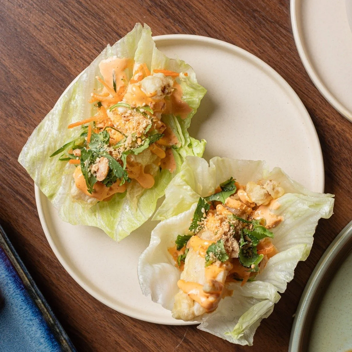 Try our Slipper Lobster Bao! Picture this: succulent slipper lobster, nestled in a crisp iceberg lettuce cup, drizzled with spicy mayo, and sprinkled with peanuts for that extra crunch.

#ChopChop #Canberra #Restaurant
