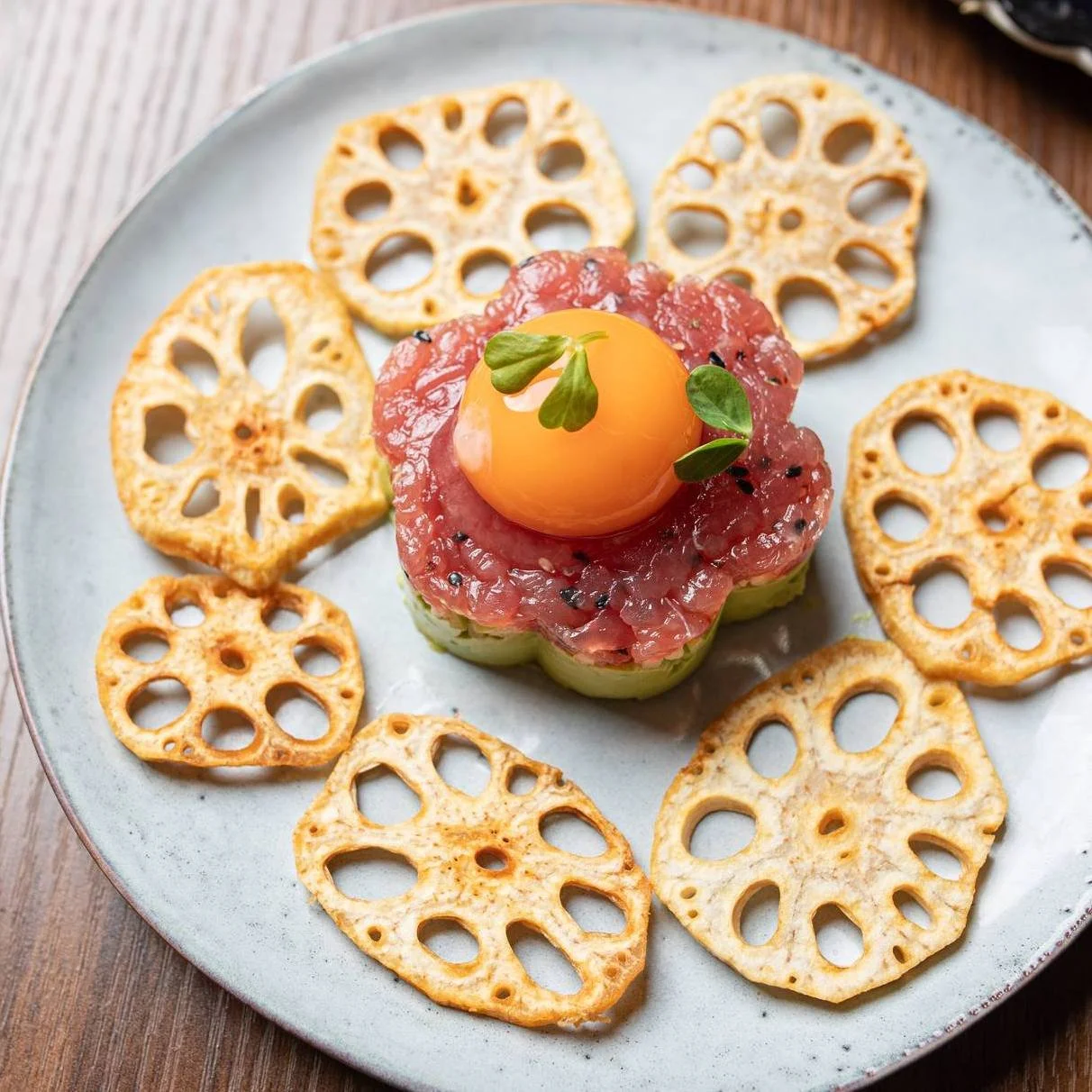 Tuna Tarutaru - a fun twist on Japanese flavours. 

Fresh tuna otoro, apple, avocado, egg yolk, and crispy lotus chips come together for a tasty and unique dish. 

Perfect for a light and refreshing bite!

#ChopChop #Canberra