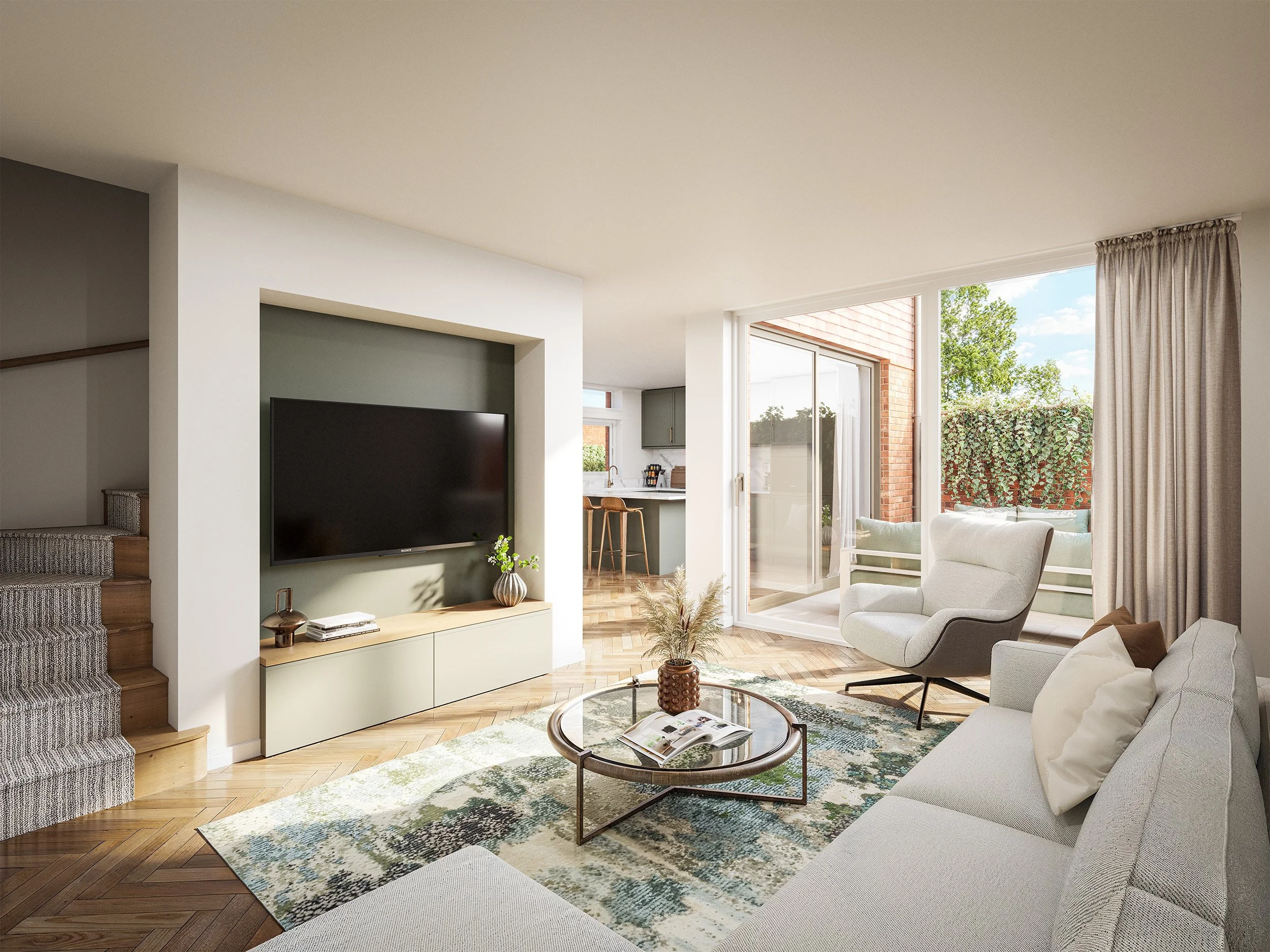 Bright and modern living room with large sliding glass doors leading to an outdoor patio, featuring a sofa, armchair, patterned area rug, and a TV mounted on a wall with a built-in shelf.