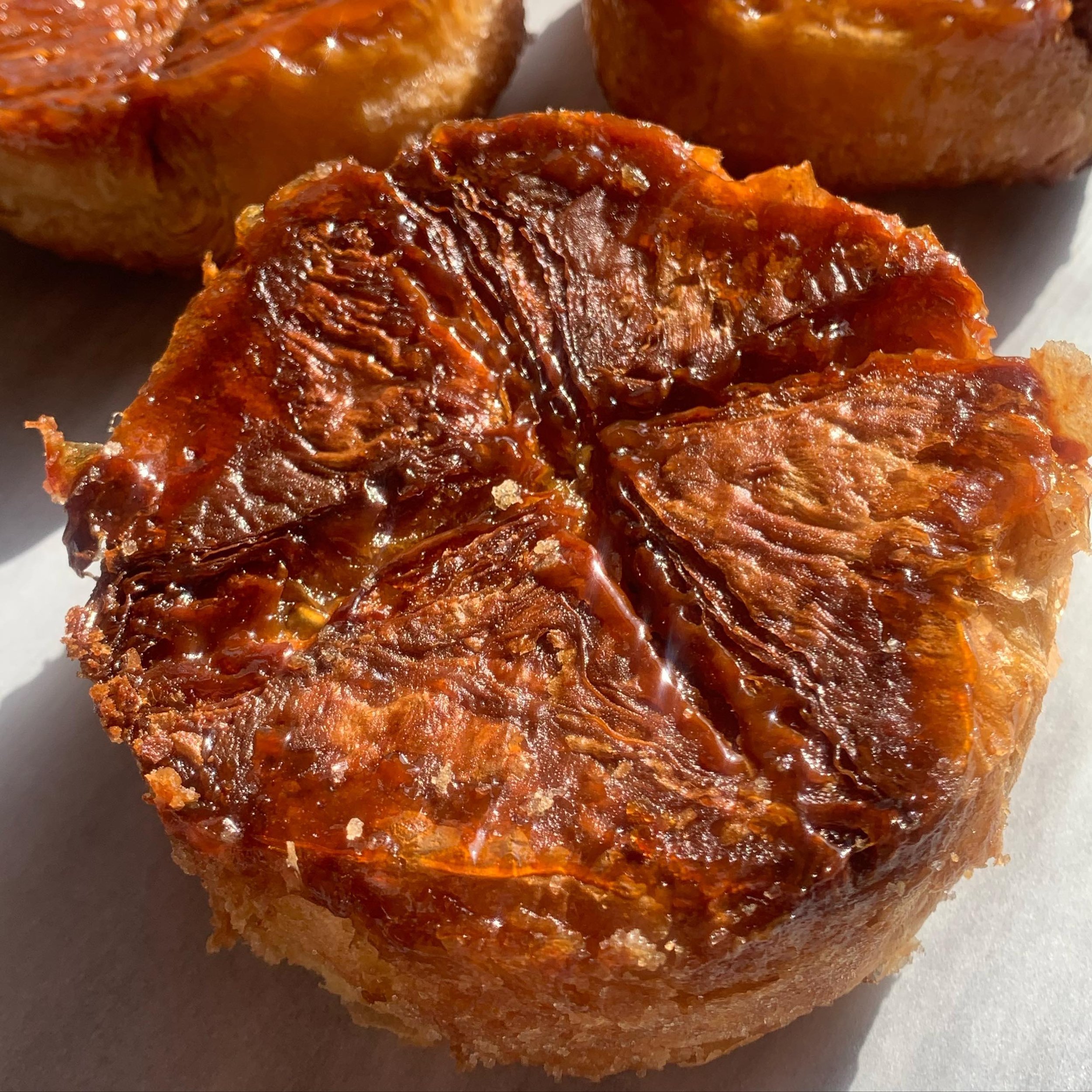 Coconut kouign amann

Flakey, caramelized dough filled with a chewy coconut caramel