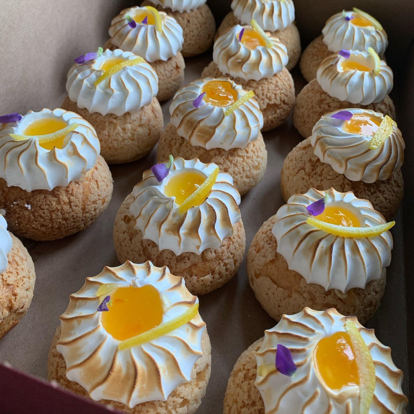 Sunny little choux buns with vanilla cr&egrave;me diplomat, citrus jelly and toasted meringue