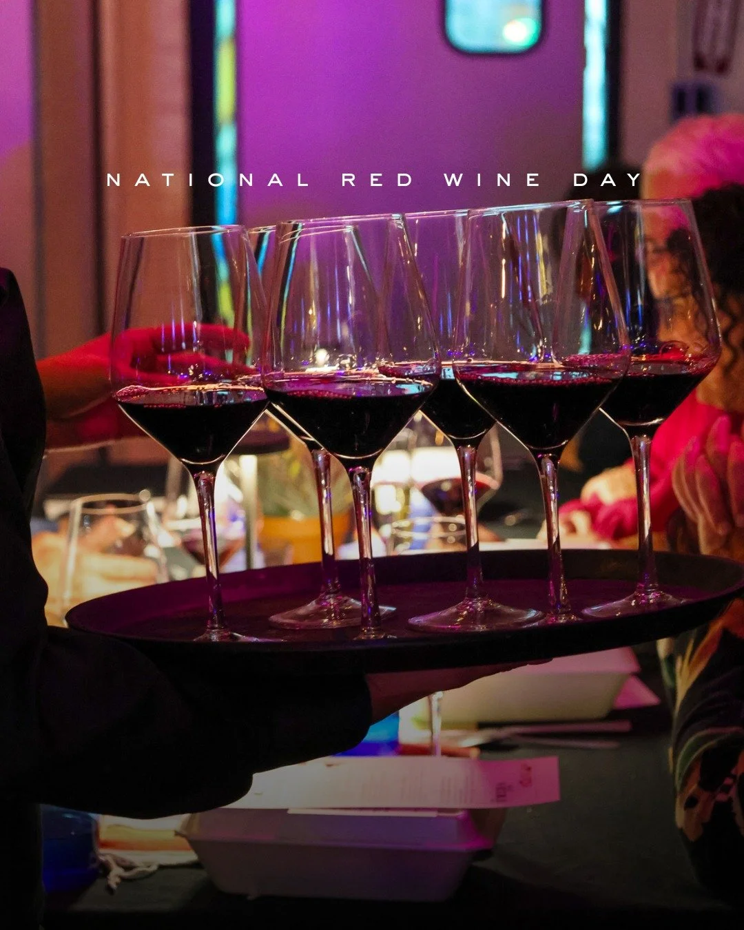 A tray full of reasons to celebrate National Red Wine Day. 🍷