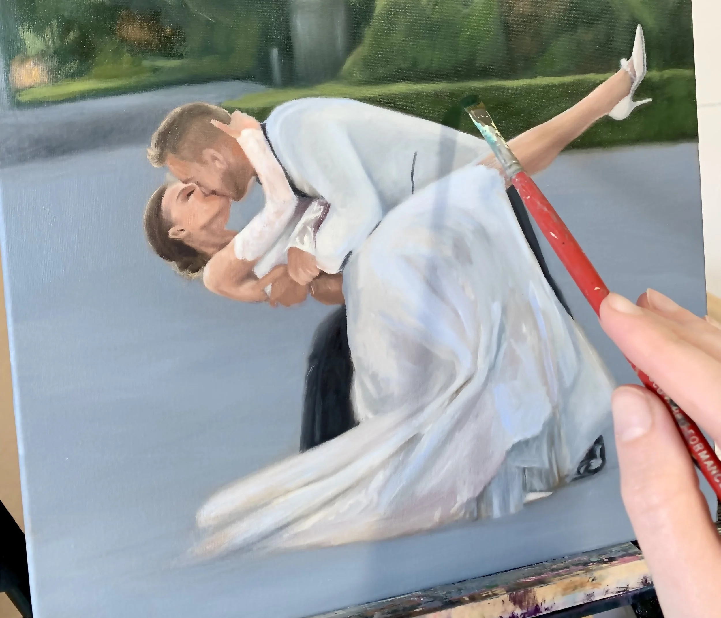 Thinking of a live wedding painter? FAQs answered