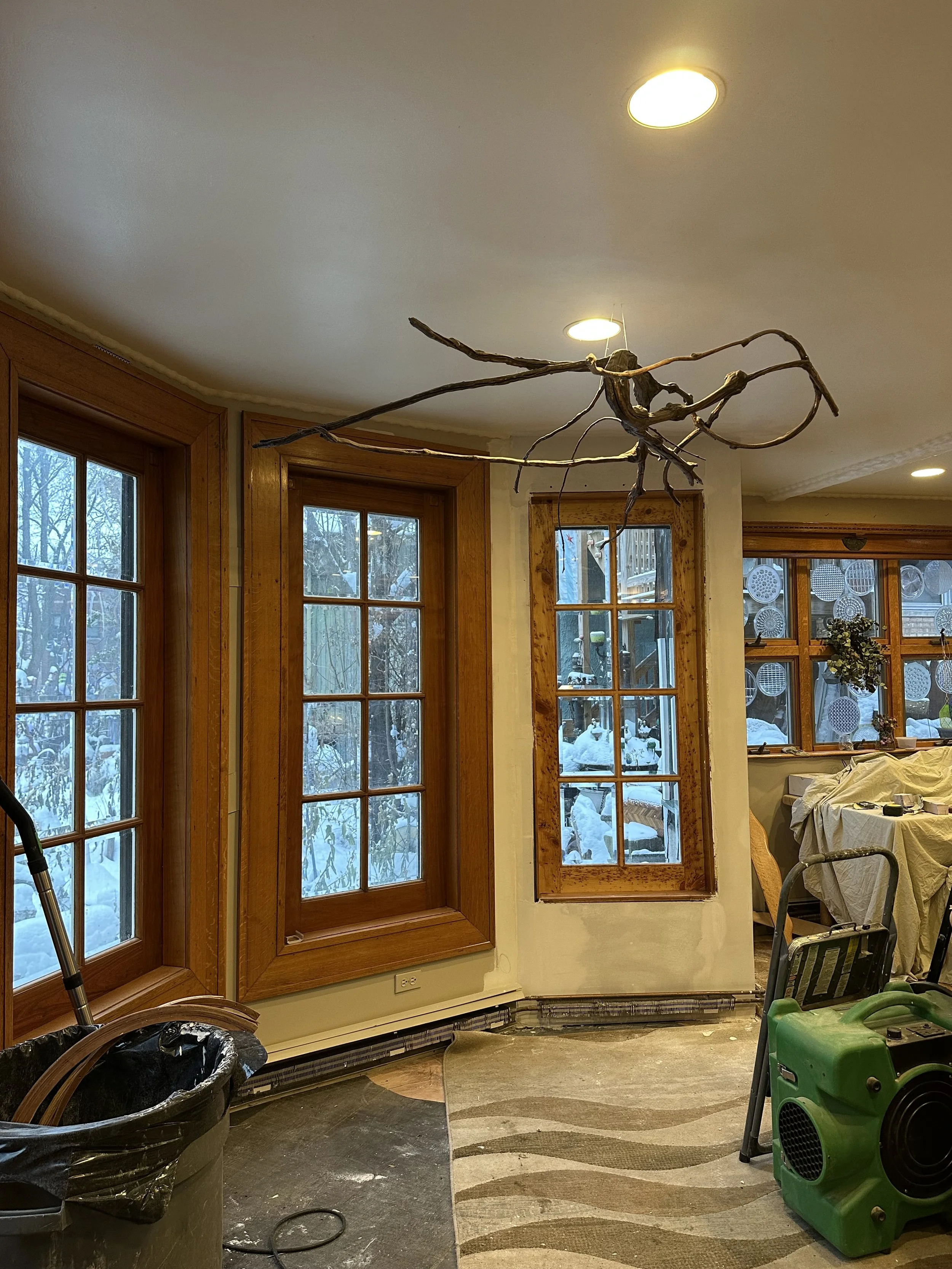 Here you see the window installed, and the wall being restored and prepped to reinstall the casing. I assisted by smoothing out the construction foam as my mentor built out the corner wall. 

I sanded and then painted, all while careful to not distur