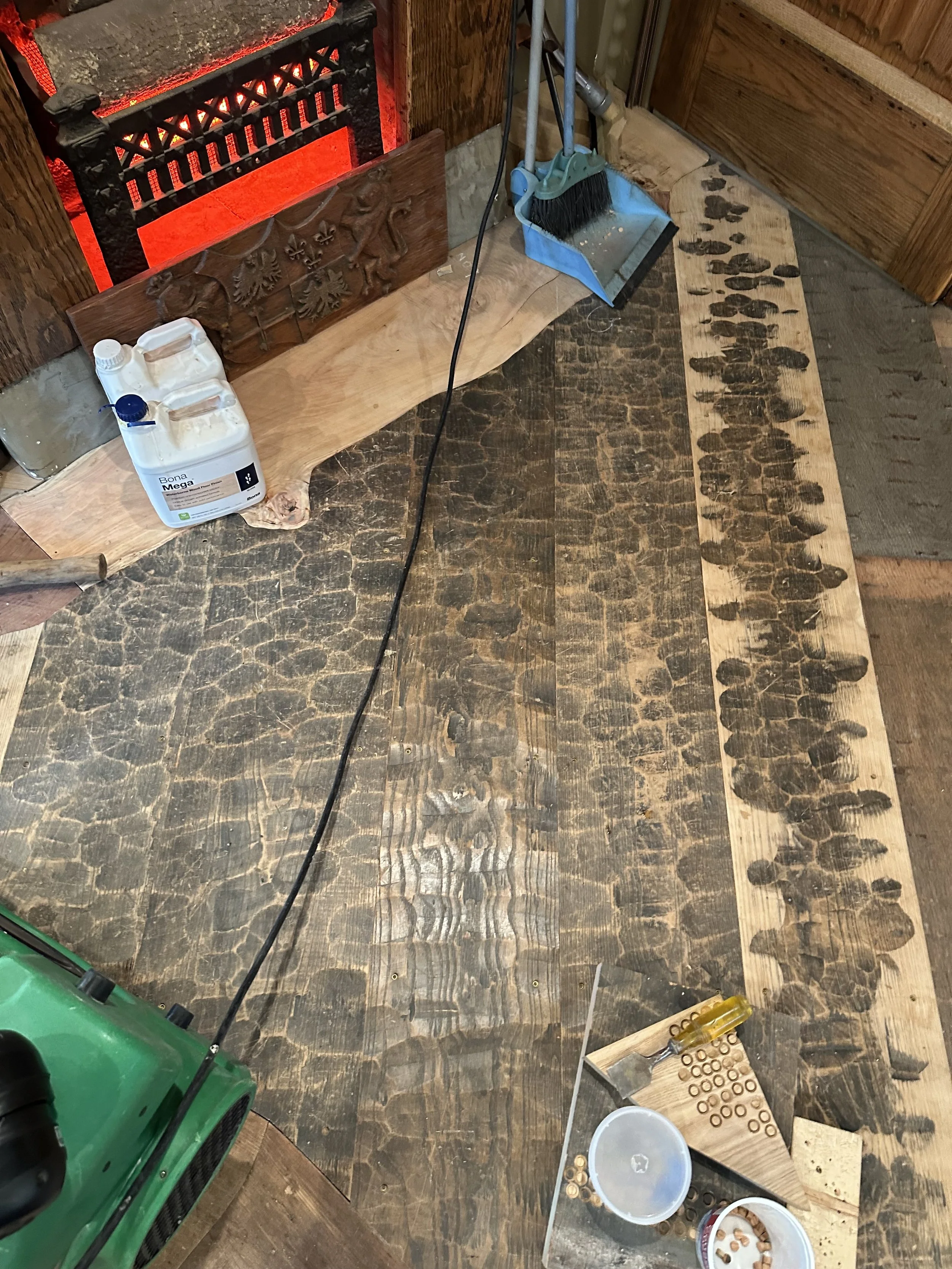 Here you can see the scalloped formations. This was the largest group of wood we were working on. There were some boards where the plugs needed to be light. I realized I could use the underside of my scrap piece to easily cut new light plugs. I was s