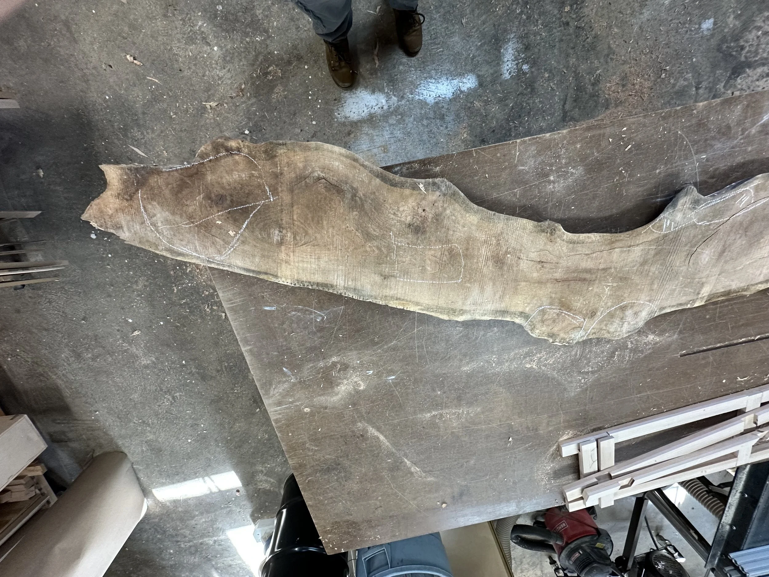 Bryan and I milled this locust wood until it was the desired depth. It was used as a decorative Header for the above window we worked on. I also traced an exact outline of the locust to be taped on the wall for creative placement discussion. 