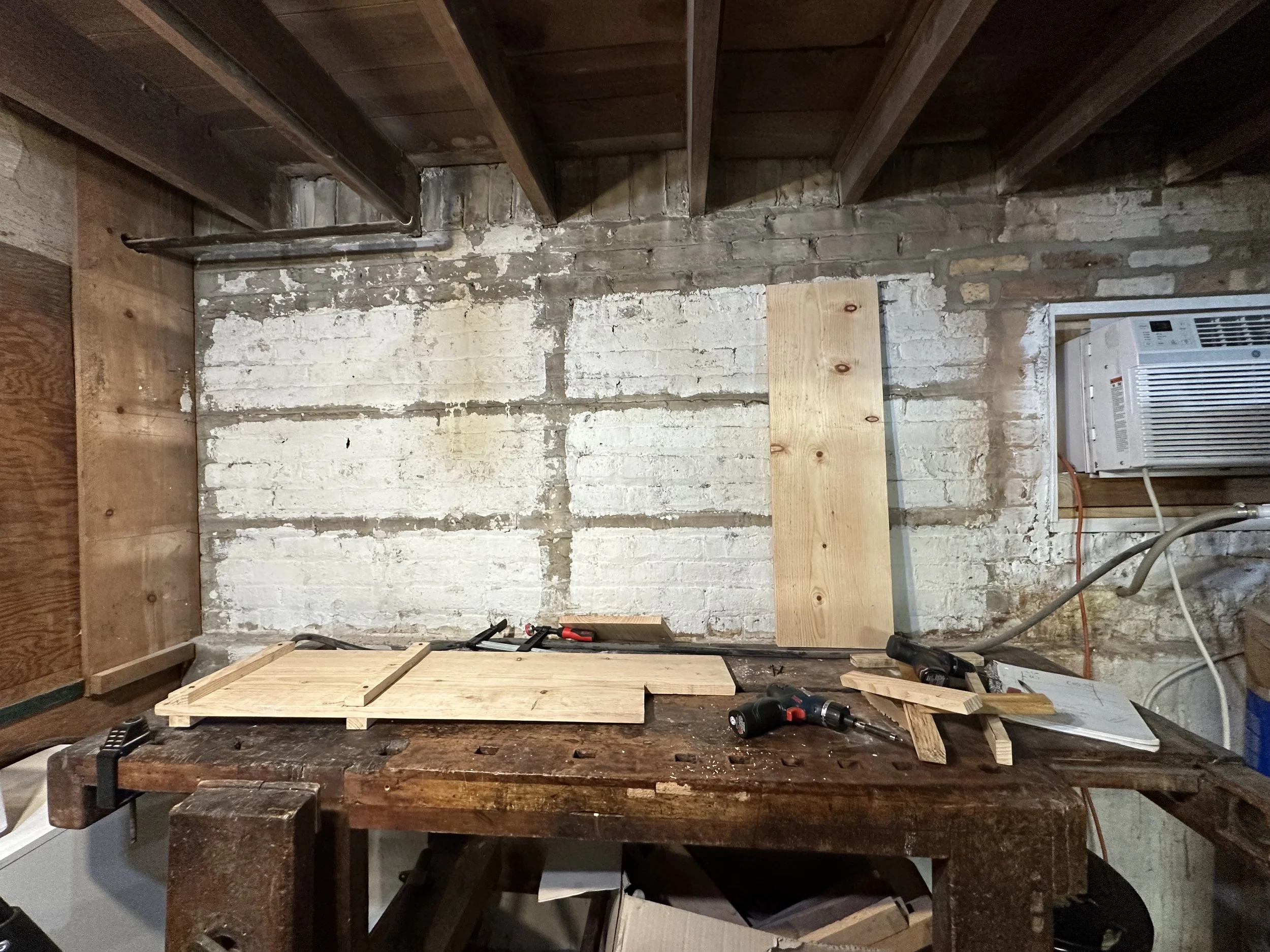 These are workshop shelves I made from scratch. I  measured the space, went to purchase lumbar, and cut the lumbar to size with a Rip Saw. That was very enjoyable. I wore gloves to avoid splinters and knee pads to support my knees while working. 