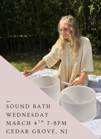 Woman with blonde hair playing crystal sound bowls outside