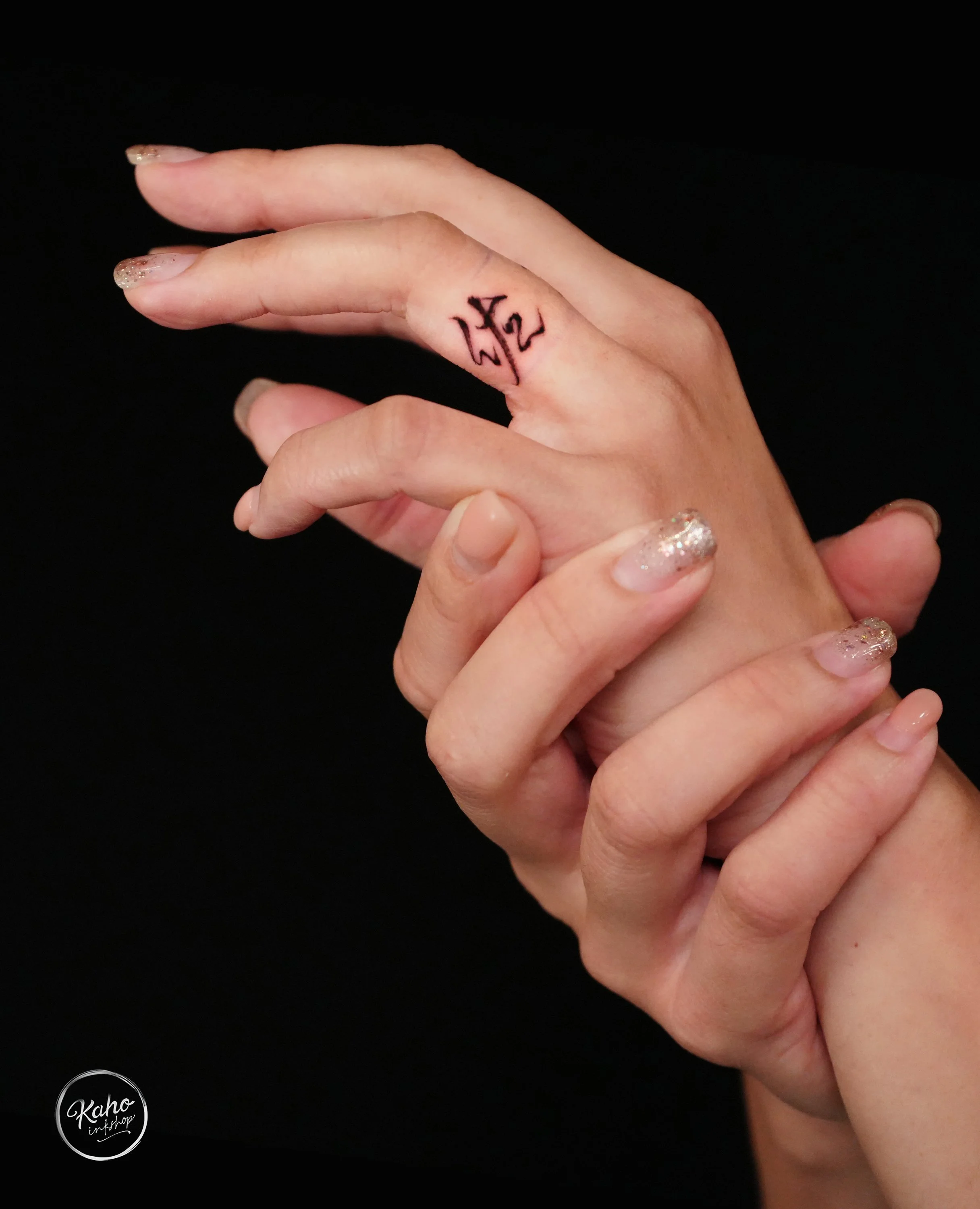 finger tattoo. Calligraphic tattoo  design and crafted by just good type. fine line tattoo , tattoo Los Angeles, San Francisco. Calforniaa