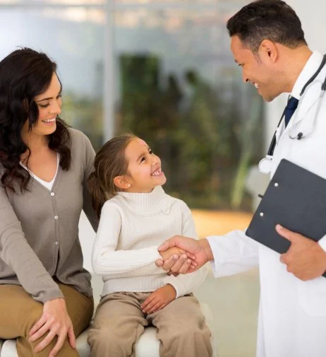 mother and child meeting their doctor