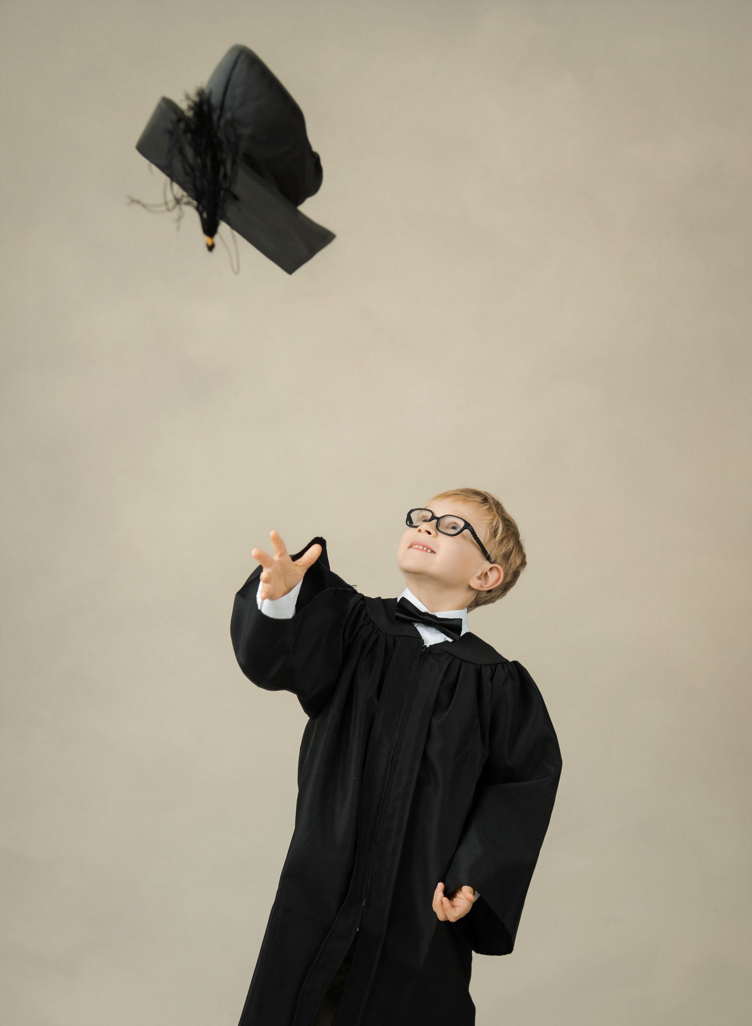 Pre-K cap toss graduation photos in the St. Louis area