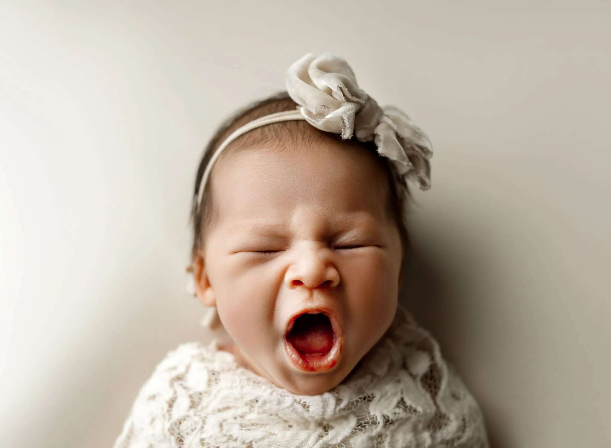 St. Louis newborn portrait, yawning