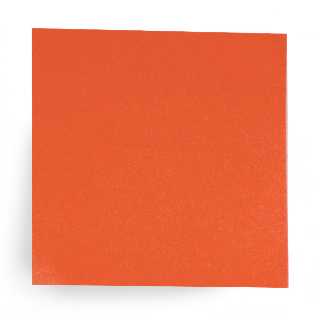 A close-up of an orange sticky note on a black surface, with a slight gradient and textured appearance.