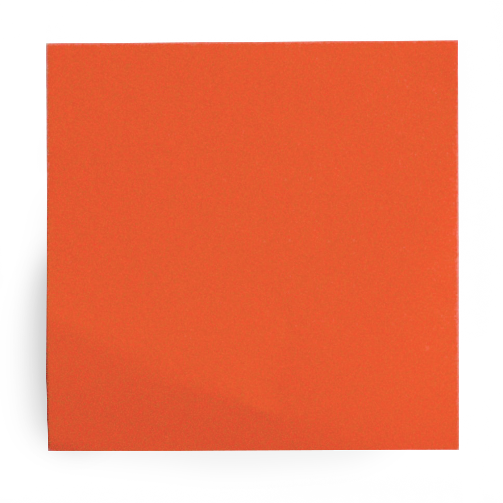 Close-up of an orange square object with a light gray background.