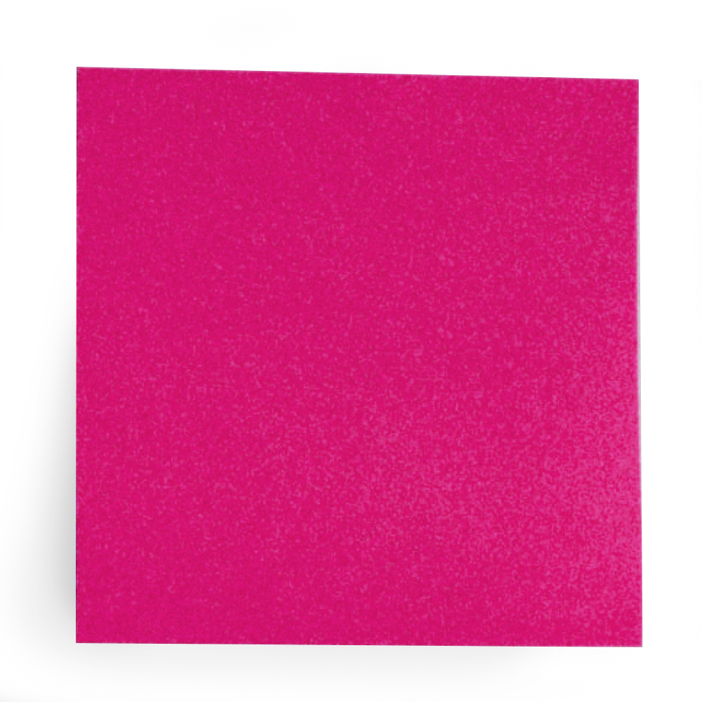 A pink textured foam block against a background with a gray surface.