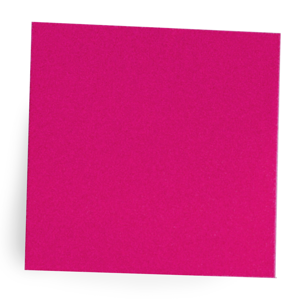 Close-up of a bright pink sticky note with slightly curled edges.