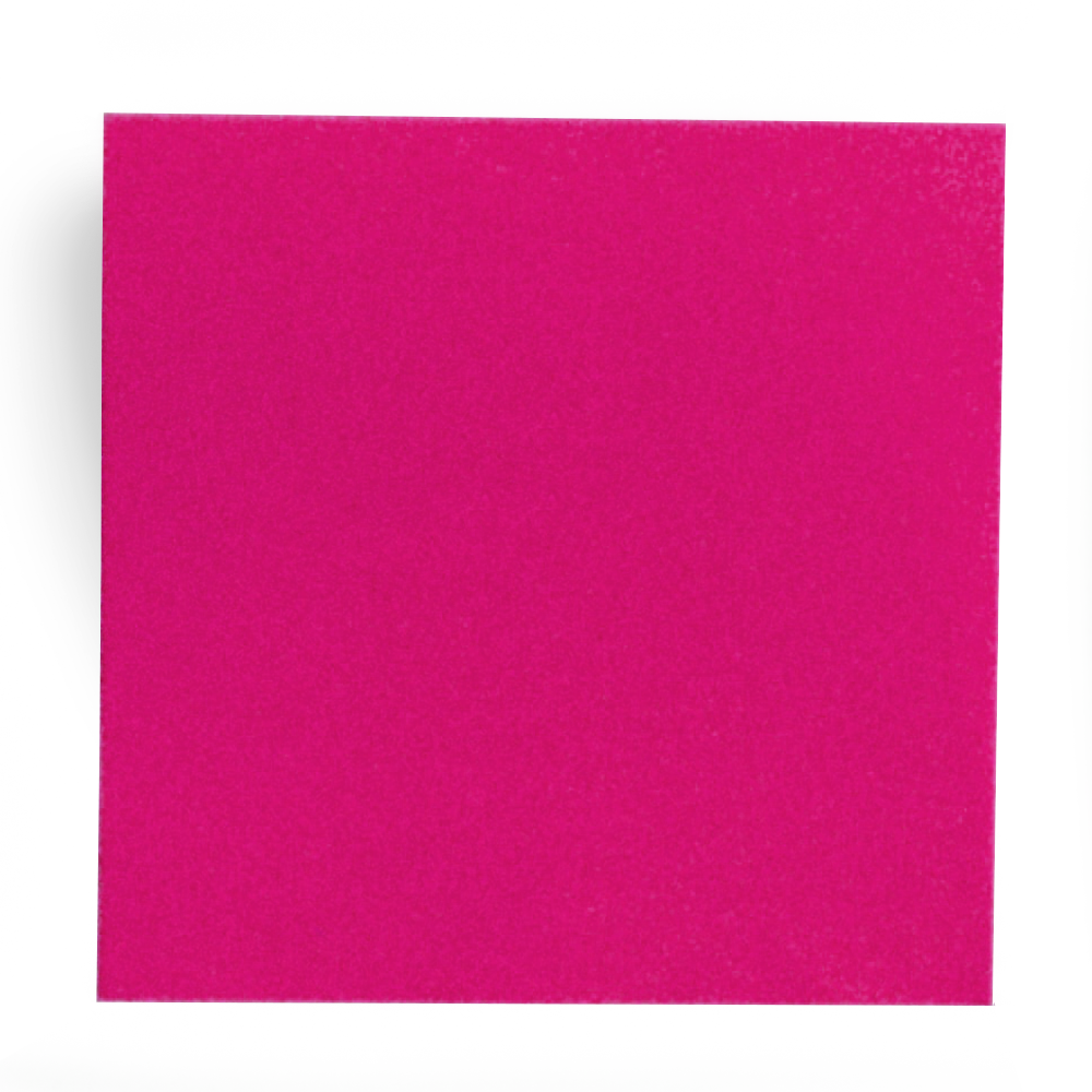 A pink rectangular object, possibly a box or a card, with a blurry background.