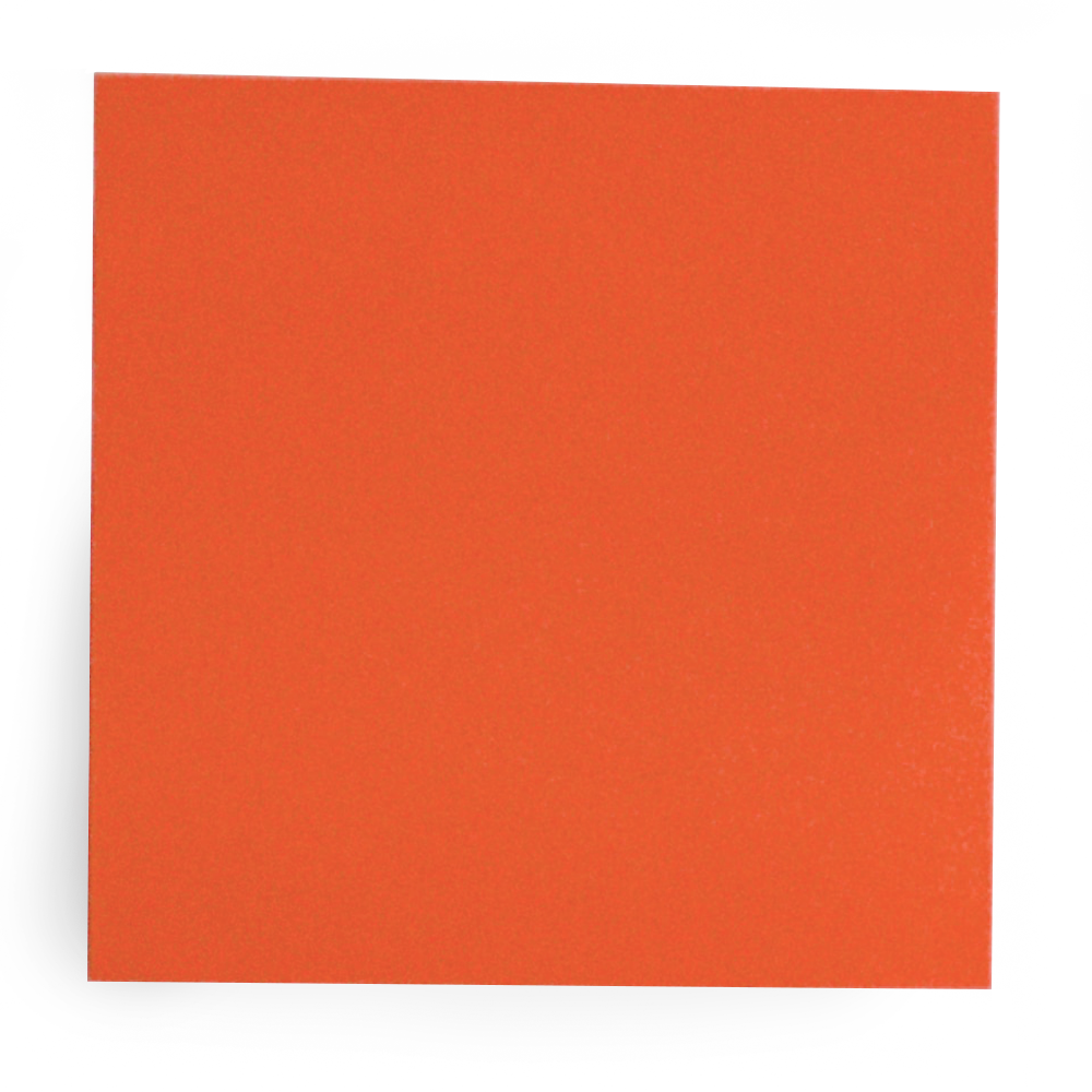 Close-up of a red-orange square object with a textured surface, possibly a piece of paper or foam board.