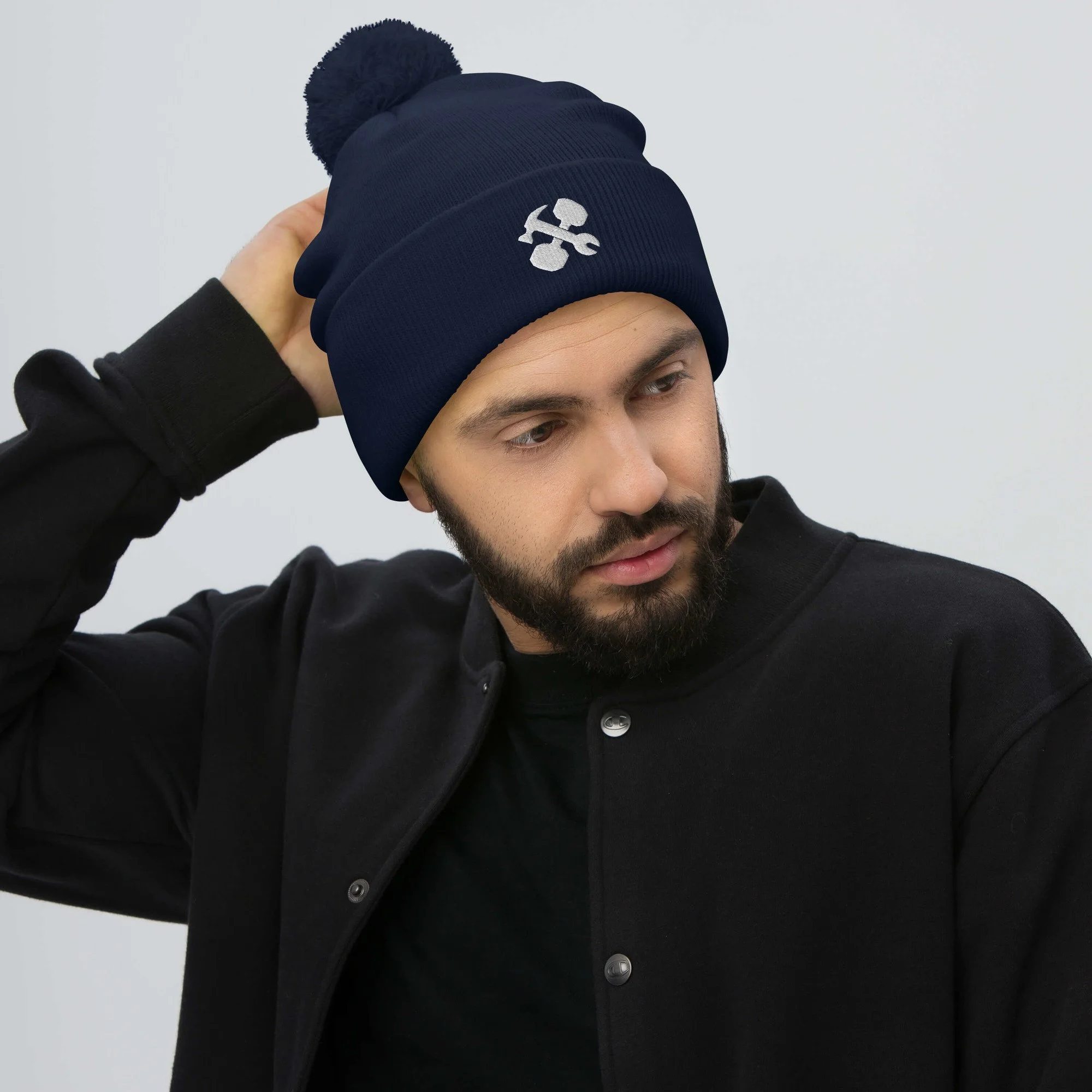 pom-pom-knit-cap-navy-front-65a1488c5e6a2.jpg