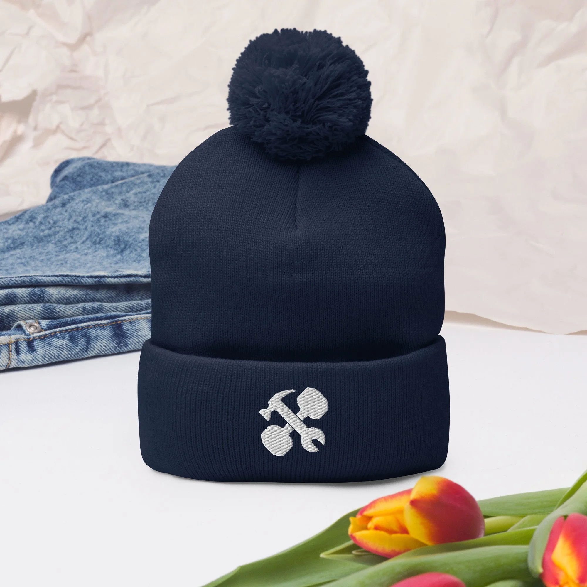 pom-pom-knit-cap-navy-front-2-65a1488c5e70c.jpg