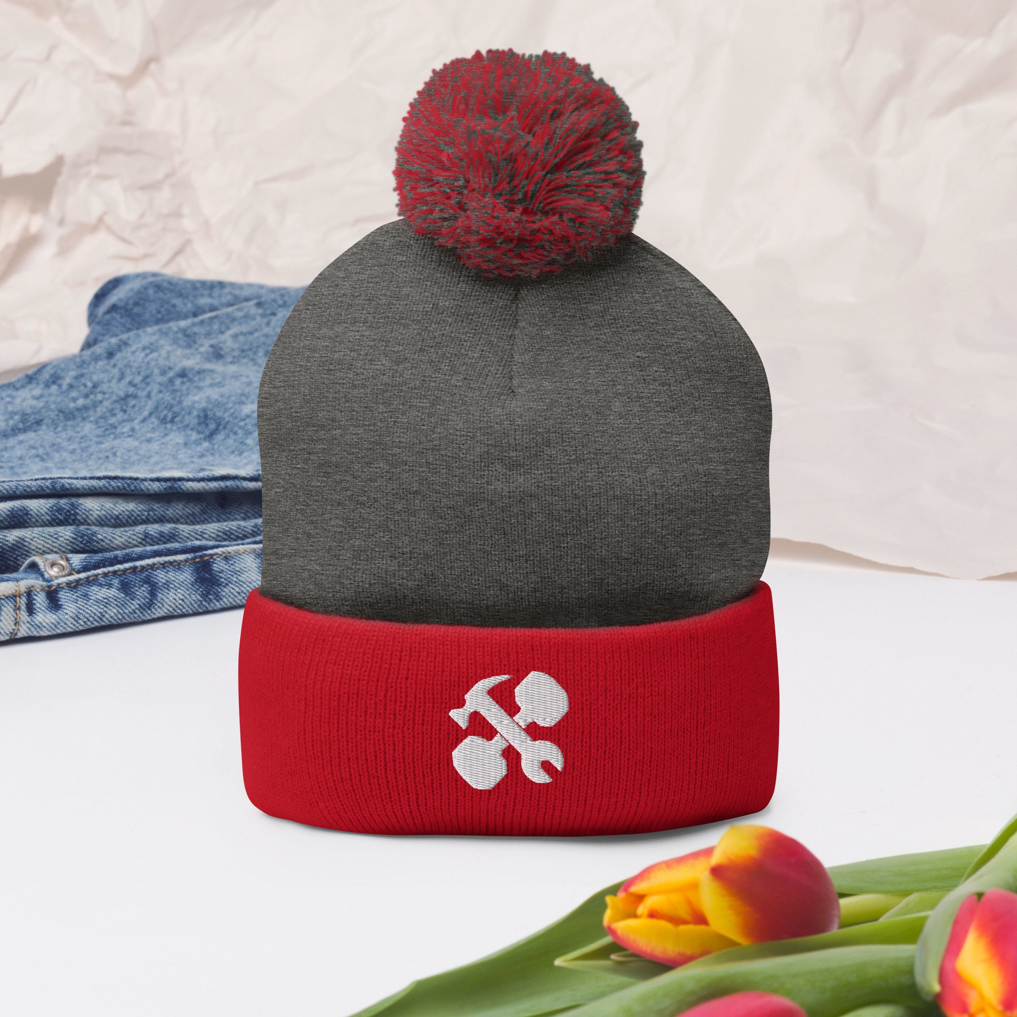 pom-pom-knit-cap-dark-heather-grey-red-front-2-65a1488c5eae4.jpg