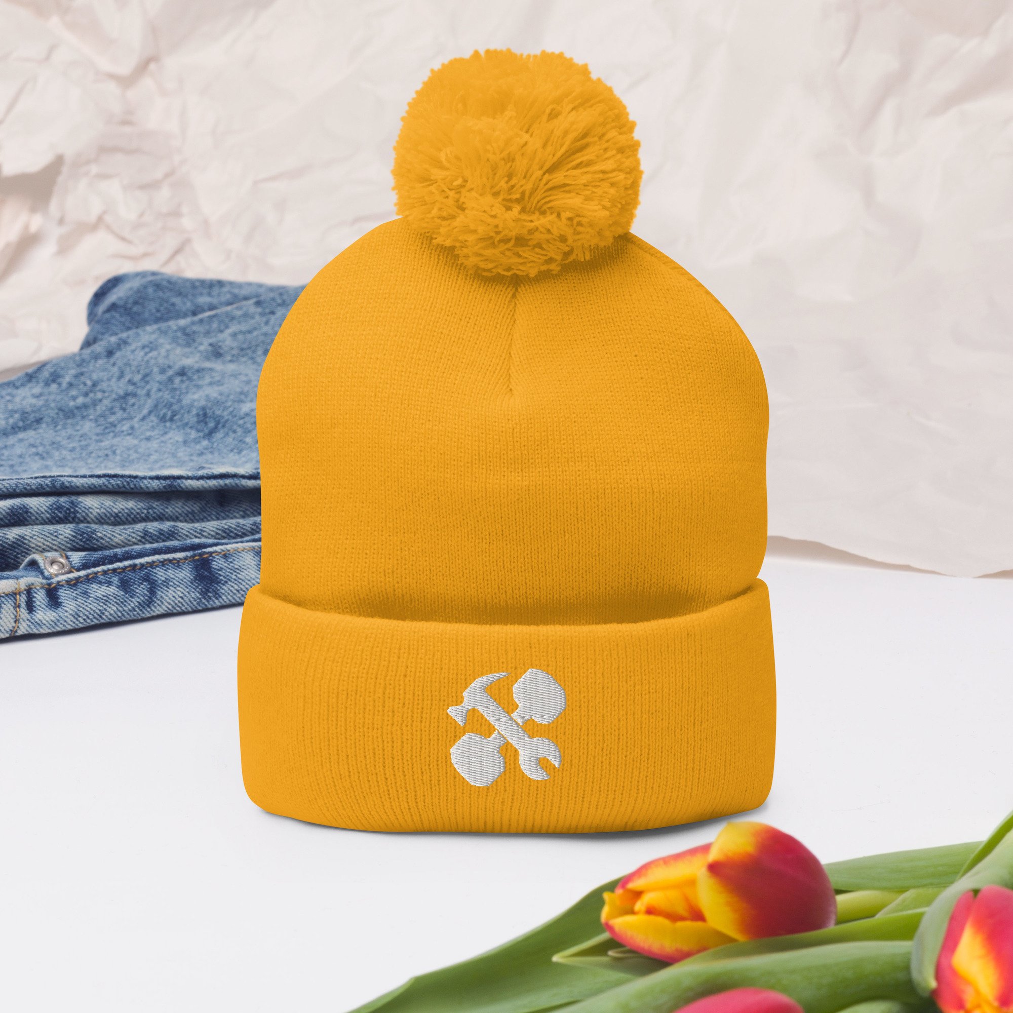 pom-pom-knit-cap-gold-front-2-65a1488c5f32b.jpg