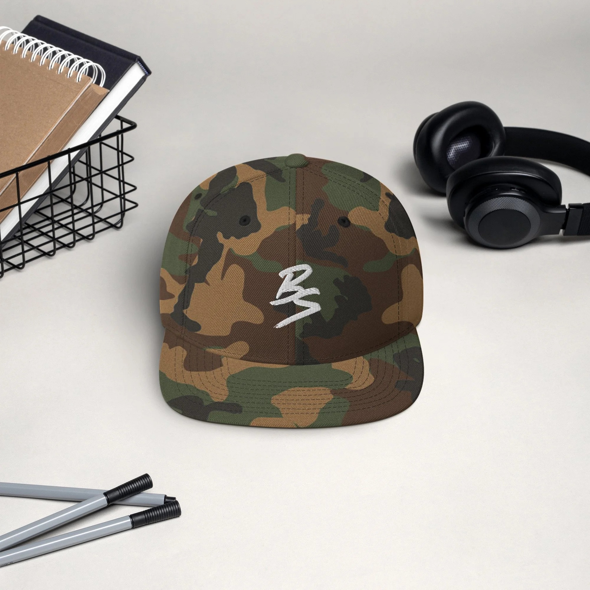 classic-snapback-green-camo-front-65a4331a75375.jpg