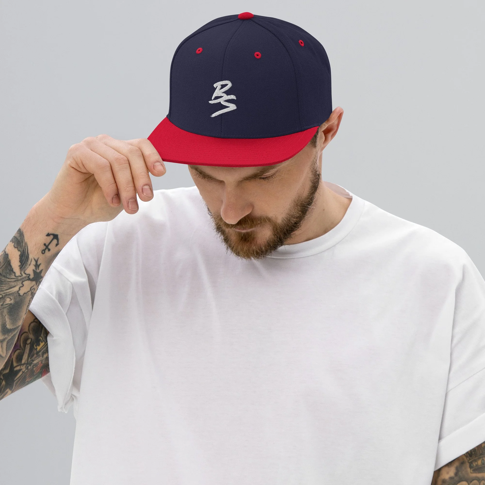 classic-snapback-navy-red-front-65a4331a76ad8.jpg