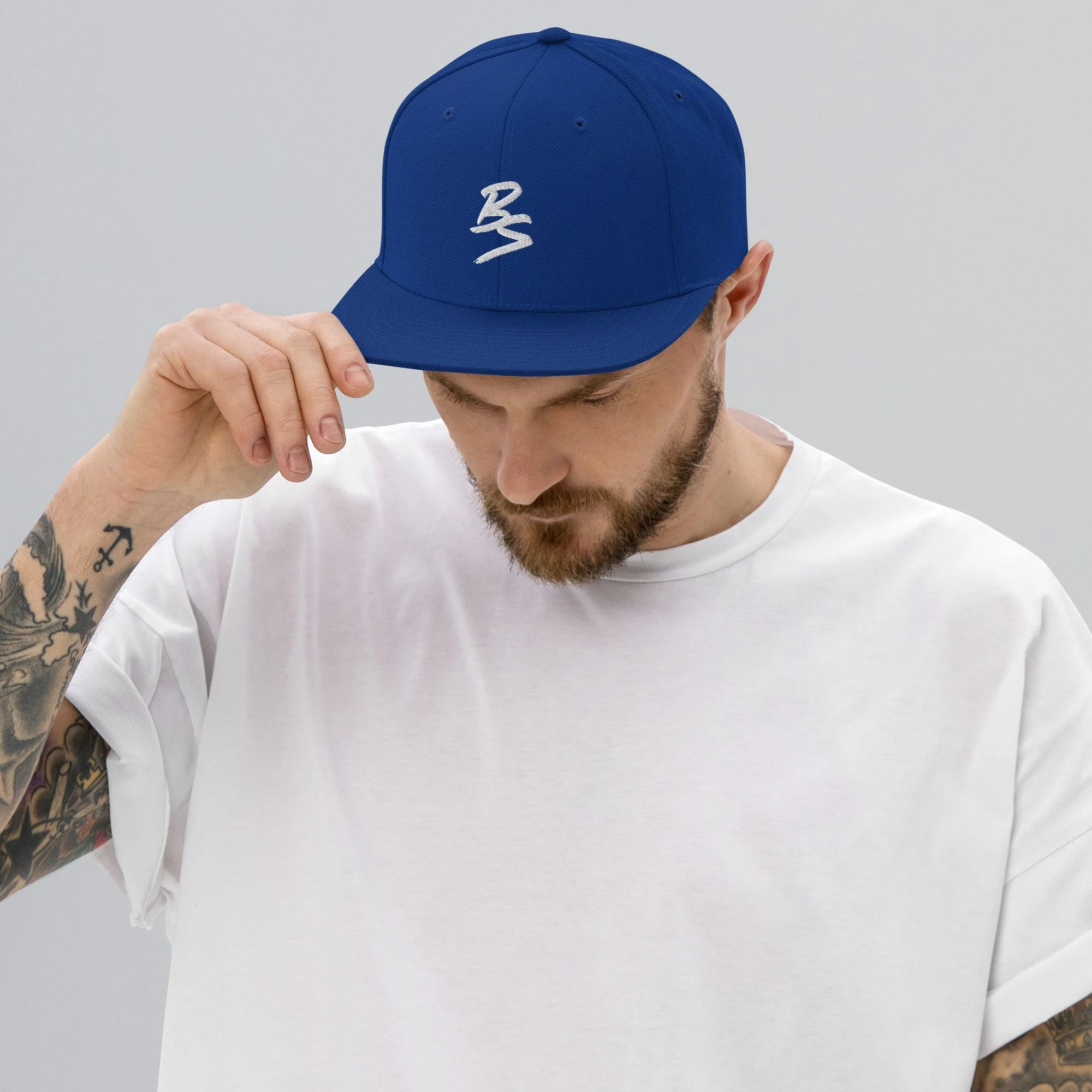 classic-snapback-royal-blue-front-65a4331a77502.jpg