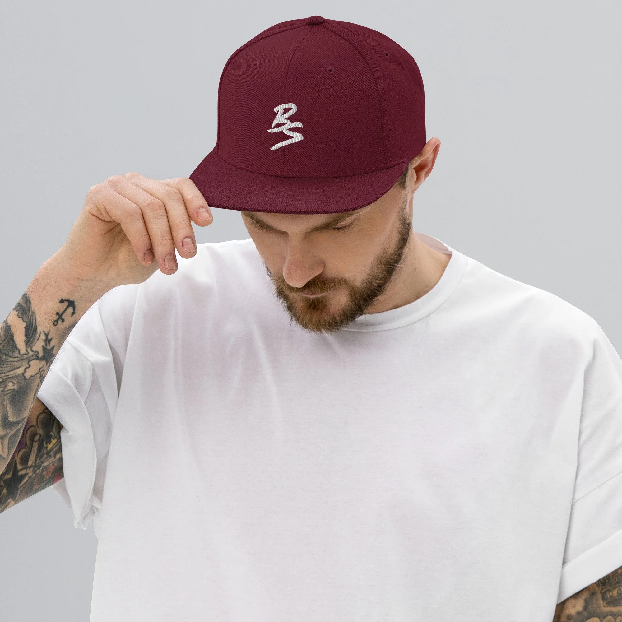 classic-snapback-maroon-front-65a4331a777cf.jpg