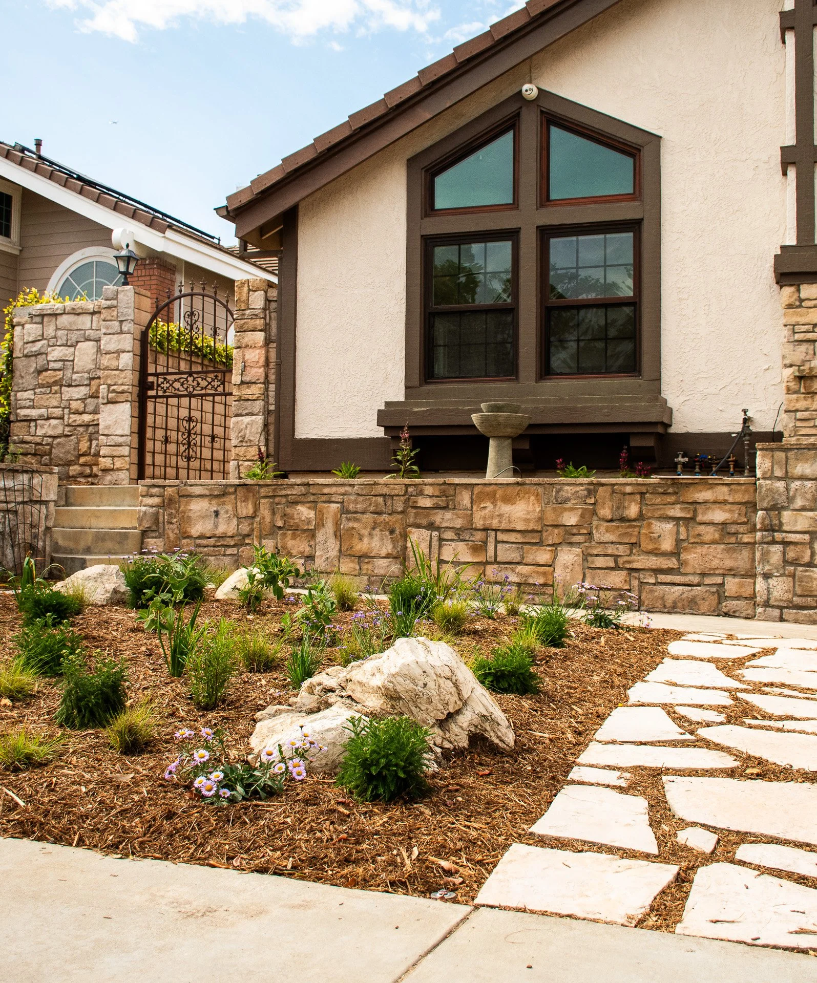Installation Day: A flagstone walkway was chosen to match the style of the existing house while still remaining permeable to rainwater.