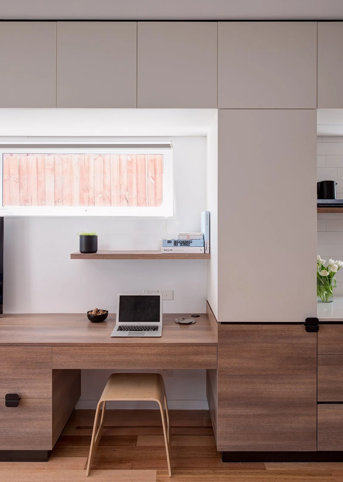 Flexible living and kitchen with custom joinery
