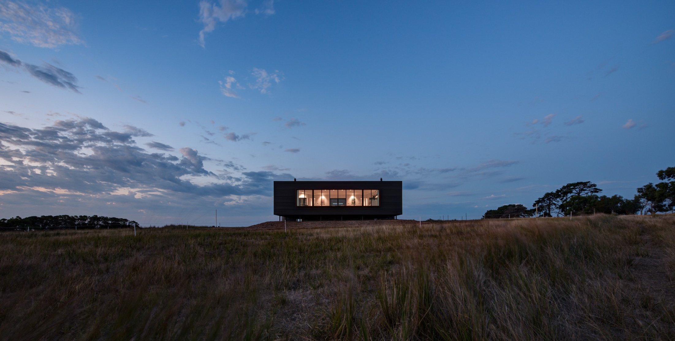 French Island off-grid prefab architecturally designed farmhouse façade