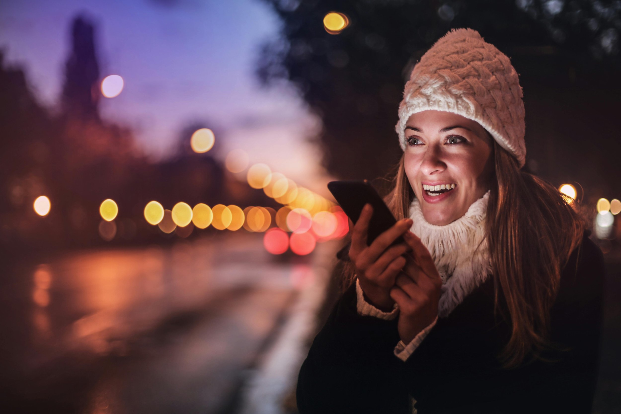 woman using a digital device, mobile phone, impersonating to be using imabi Travel Guardian - personal safety app to share her wherabouts with her trusted contacts