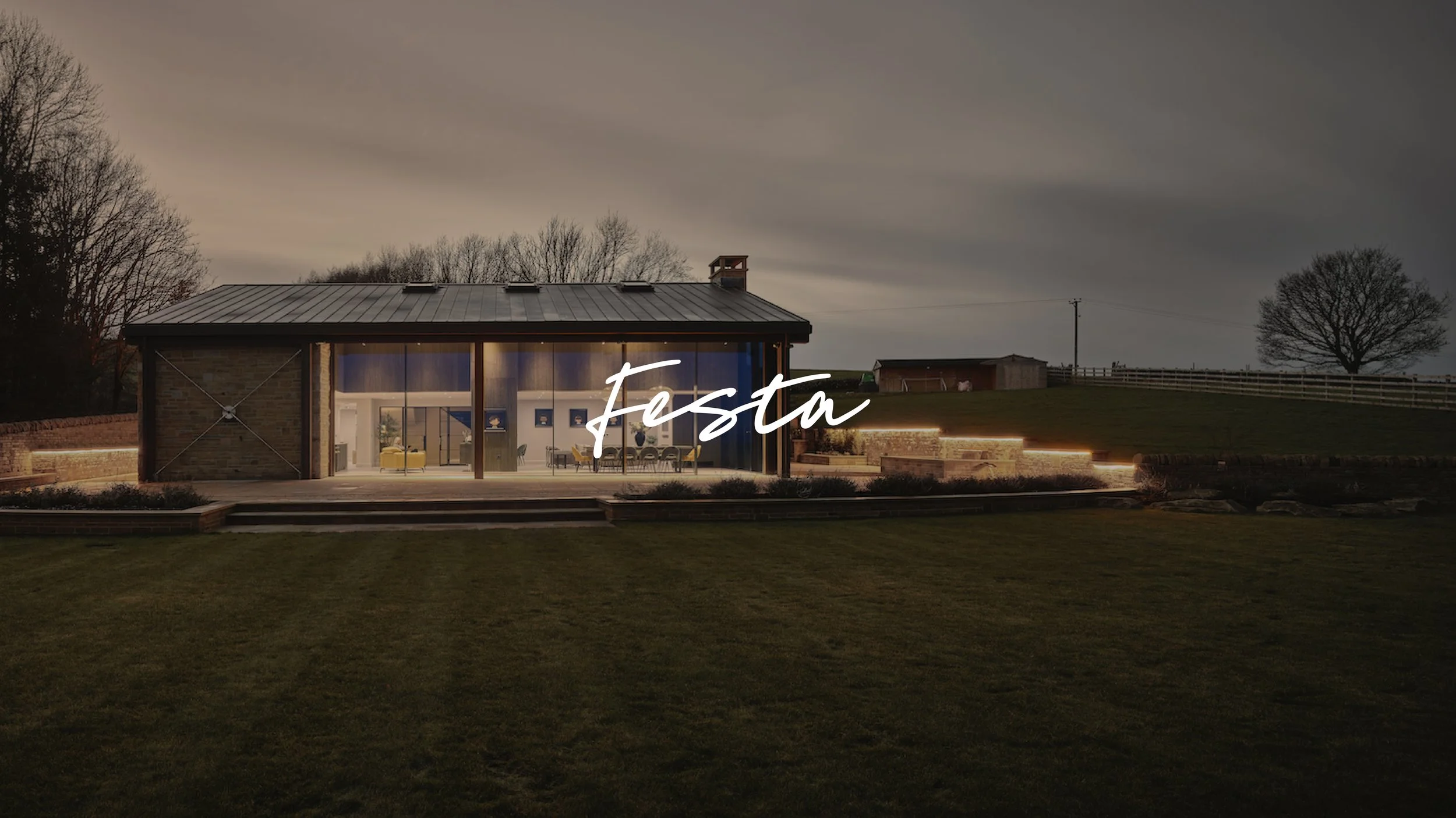 Festa logo over an image of a luxury barn conversion.