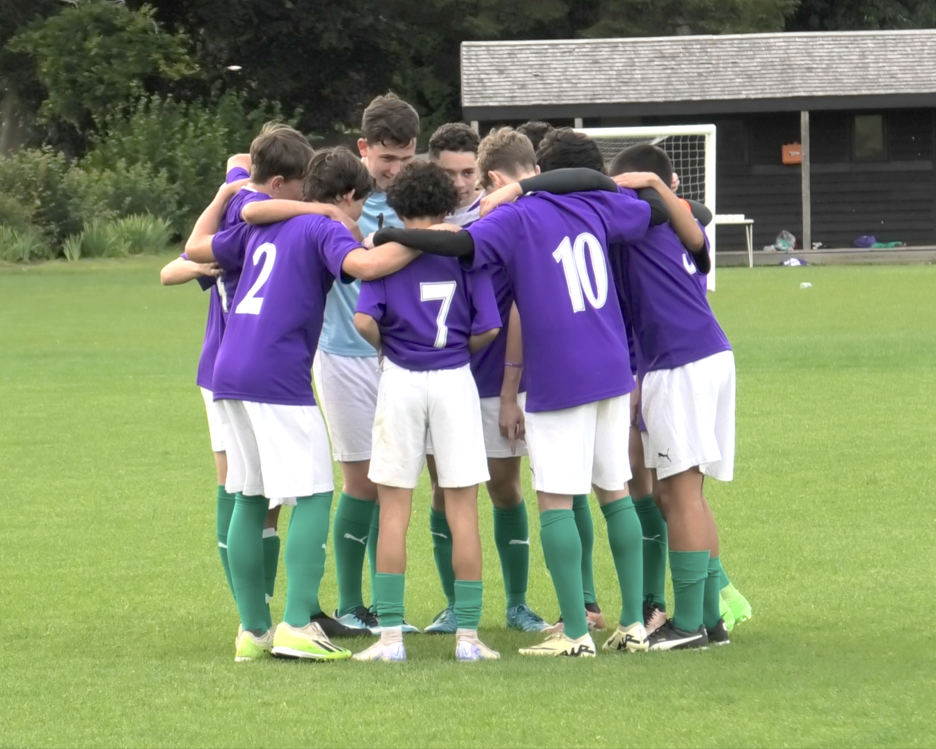 Football Academy Team Huddle.png